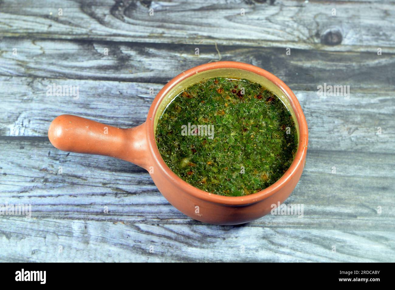 Mulukhiyah, also known as molokhia, molohiya or ewedu, a dish made from the leaves of Corchorus olitorius, commonly known in English as denje'c'jute, Stock Photo