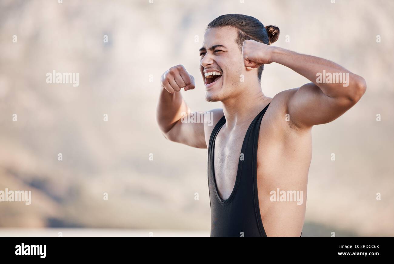 Strong wrestling man, winner and celebration with fist, muscle and