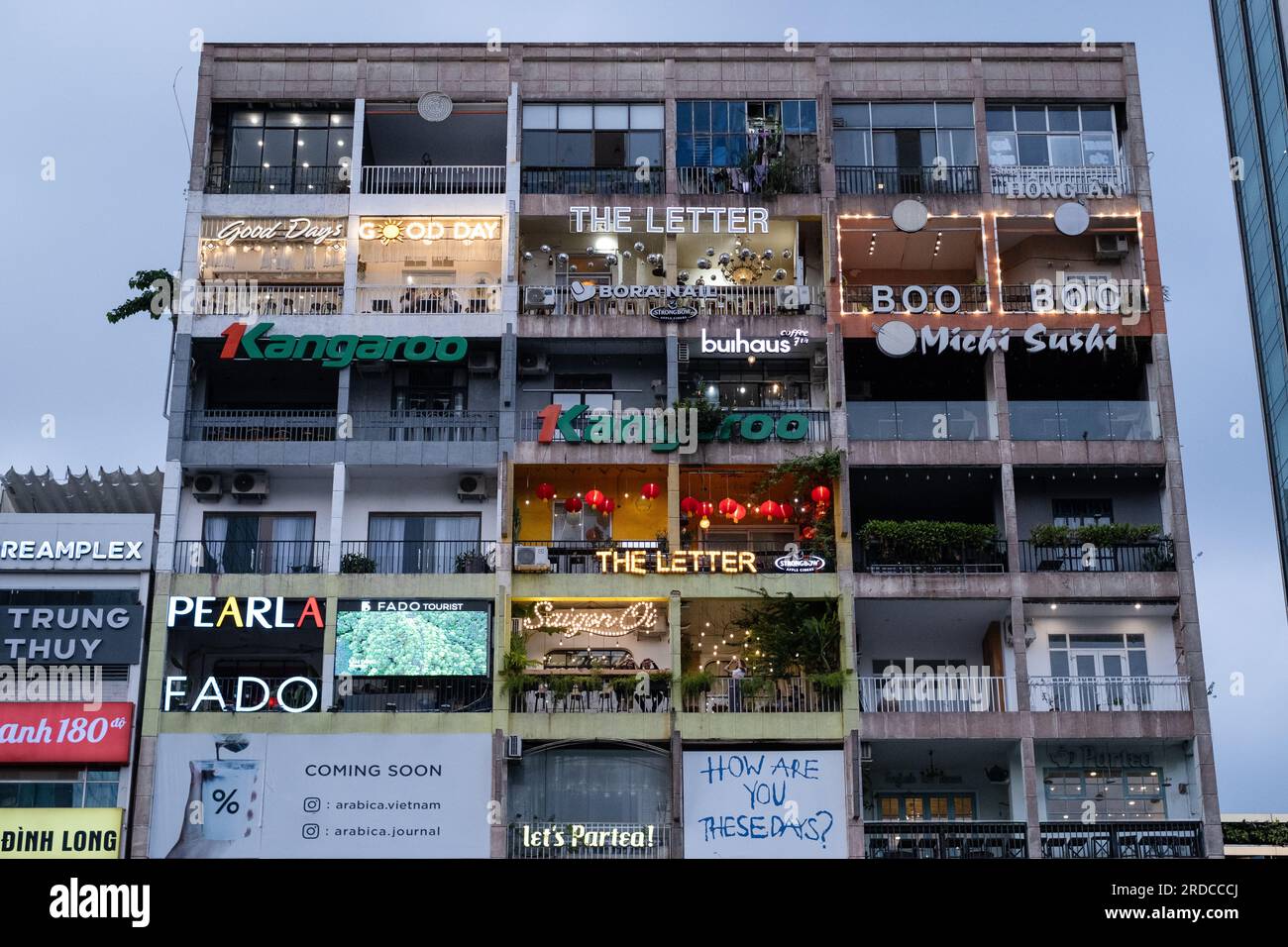 The Cafê Apartments, Ho Chi Minh City, Vietnam, in the evening Stock Photo  - Alamy