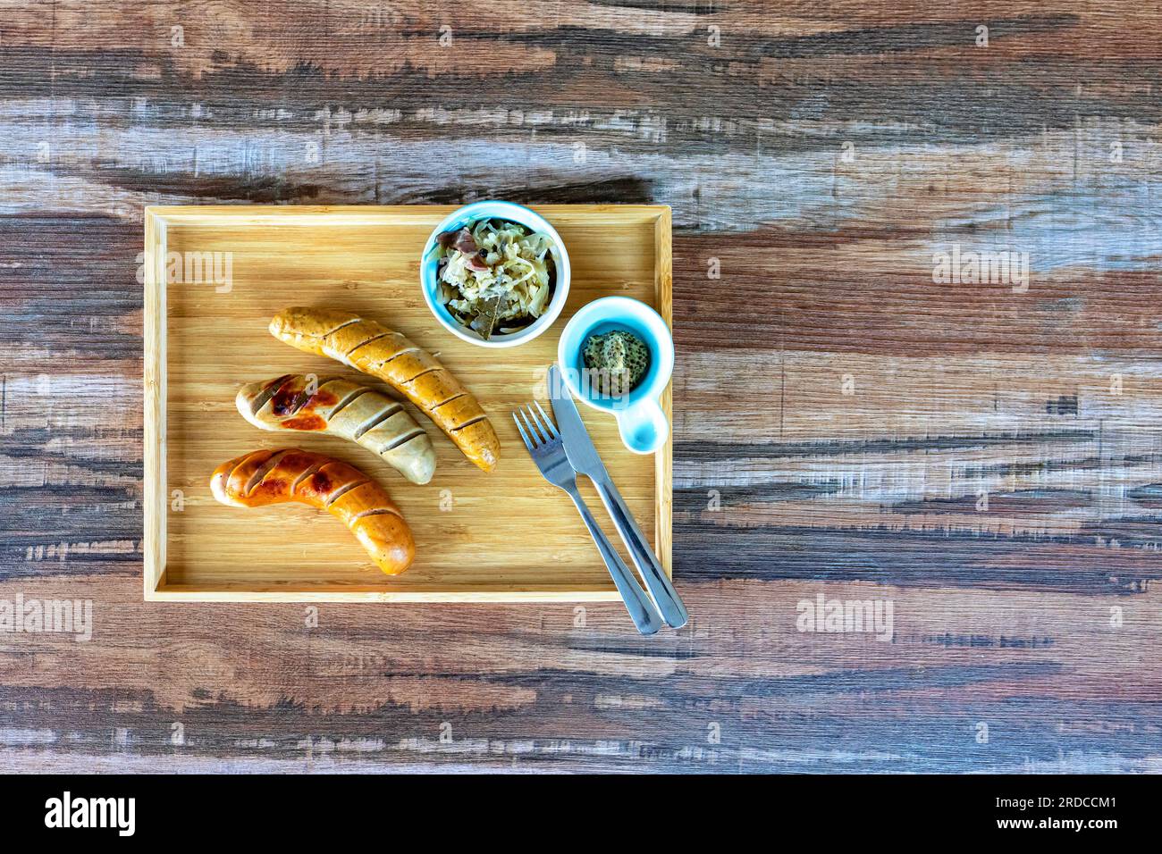 Top view of grilled German sausages, cooked to perfection, with