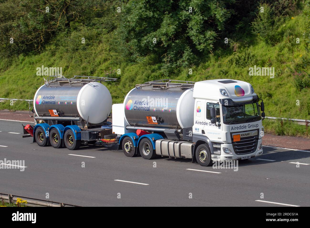 Airedale Group UK-based award-winning manufacturer and distributor of speciality and commodity chemicals tanker & trailer distribution fleet; rubber-lined tankers travelling at speed on the M6 motorway in Greater Manchester, UK Stock Photo
