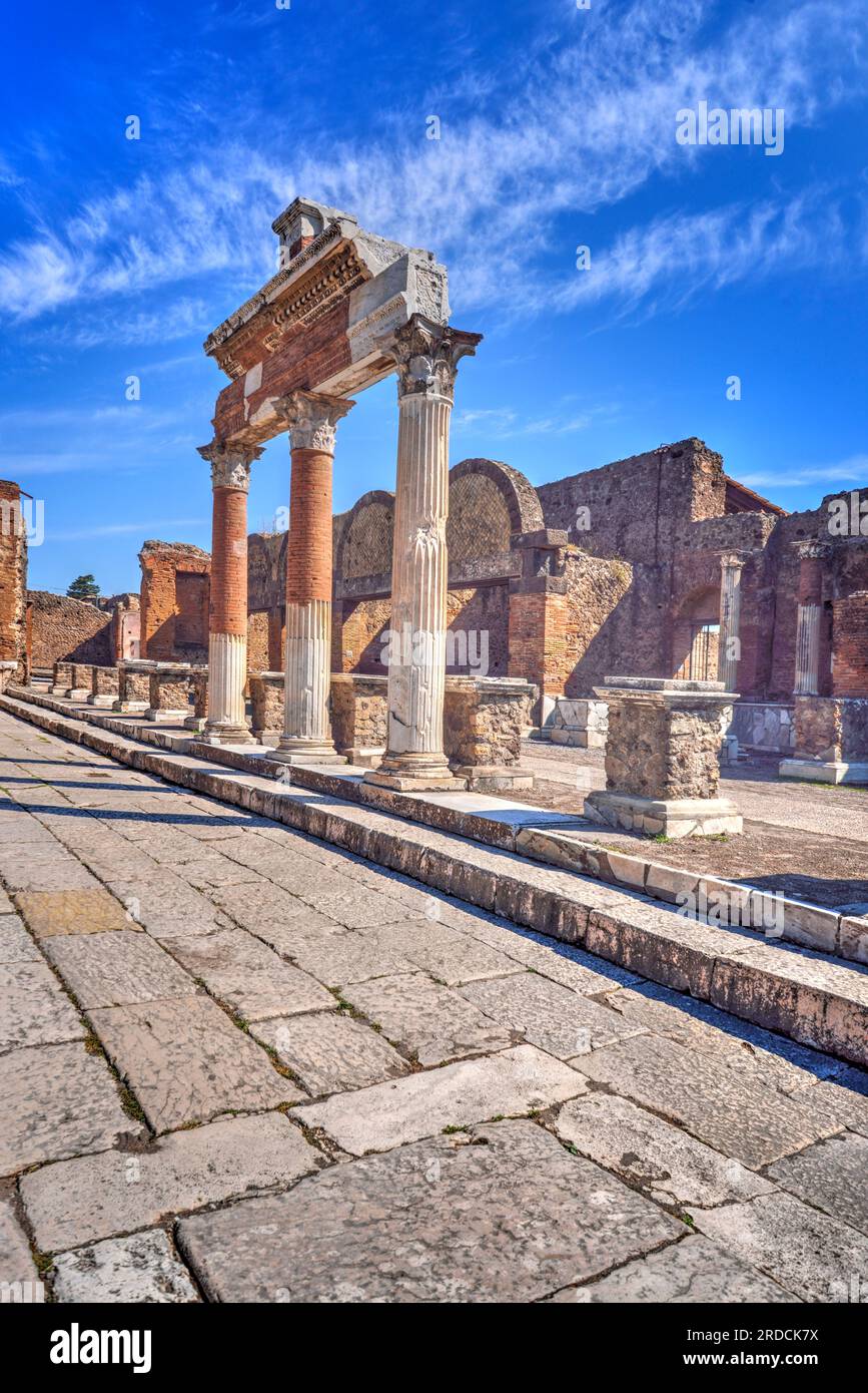Aicent Rome Collums Pompeii near Naples, Italy. Ancient Roman columns with paving stones ...