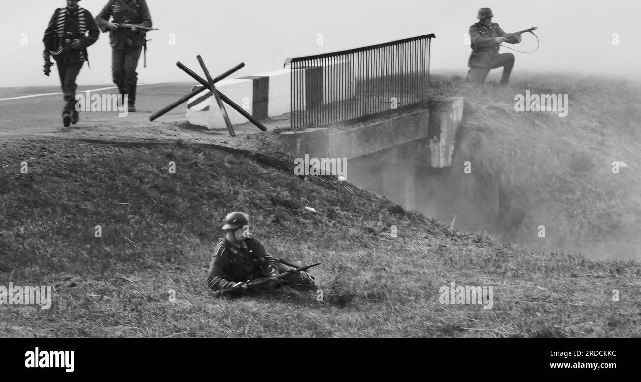 German Infantry Soldiers Fighting With Russian Soldiers. Mortar Shooting, Explosions. Black And White Stock Photo