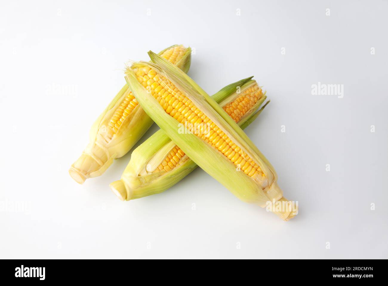 raw corn maize cob isolated on white background Stock Photo