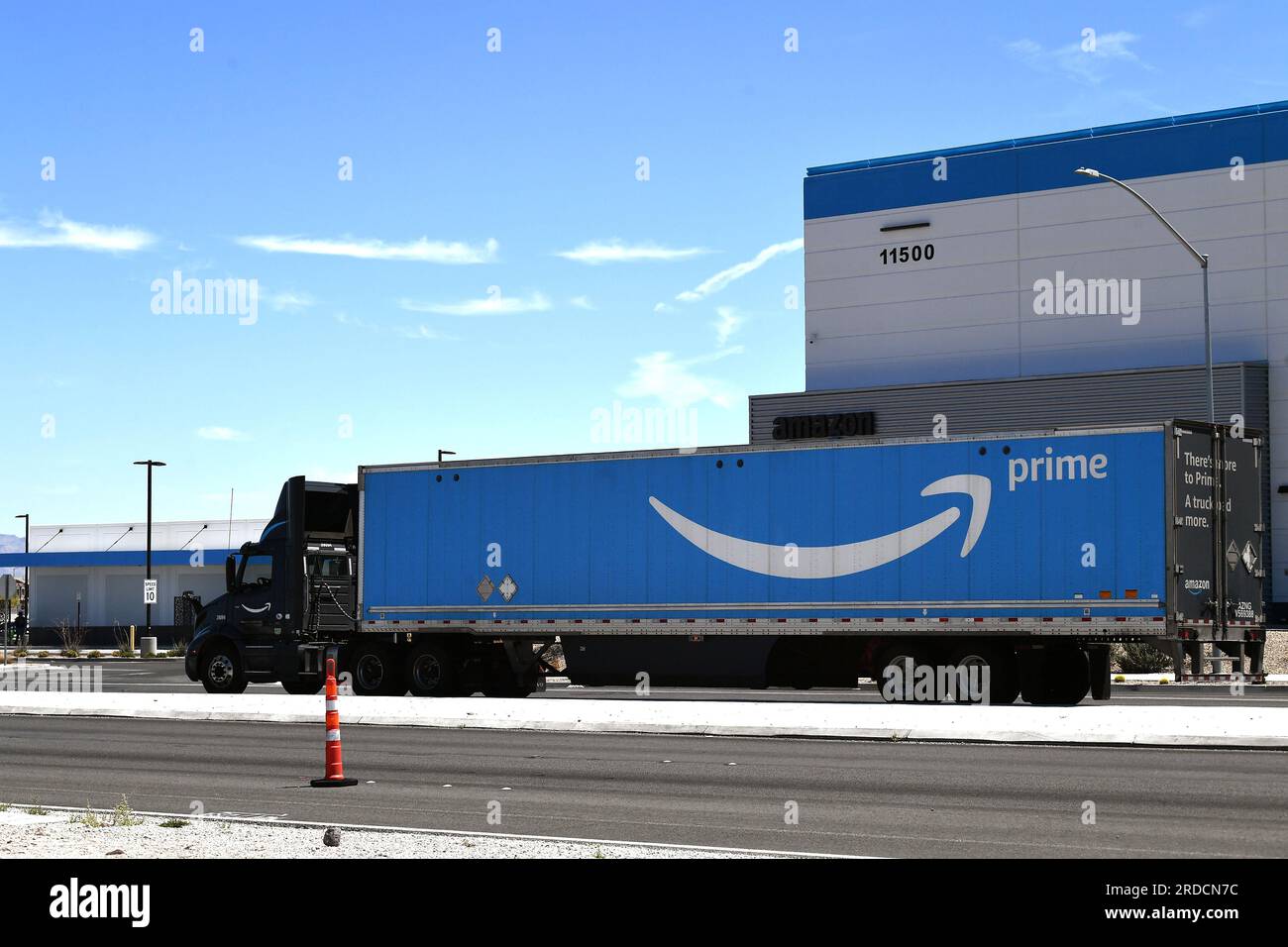 Henderson, USA. 13th July, 2023. An Amazon trailer passes in front of an Amazon delivery