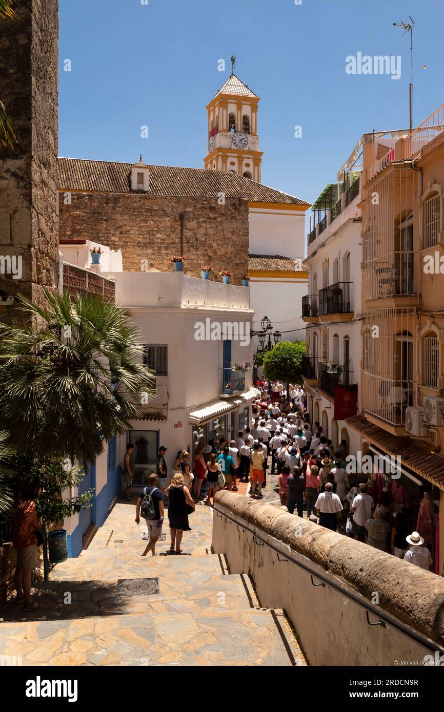 Statue of Saint Bernard on the float being carried into the church in the Romeria San Bernabe; Marbella, Costa del Sol, Malaga Province, Andalusia. Stock Photo