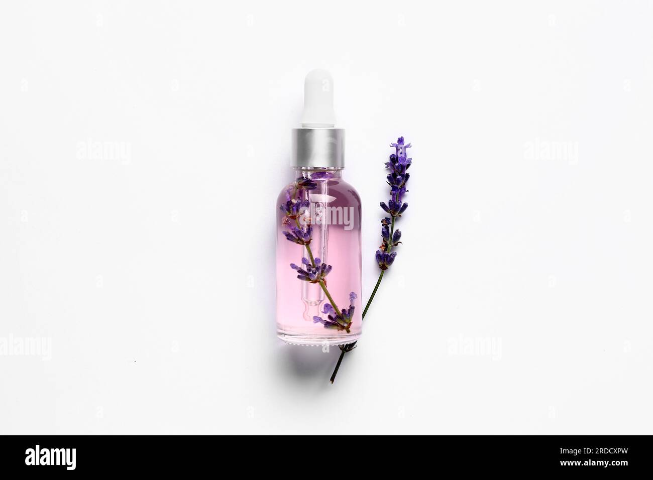 Bottle of lavender essential oil isolated on white background Stock ...