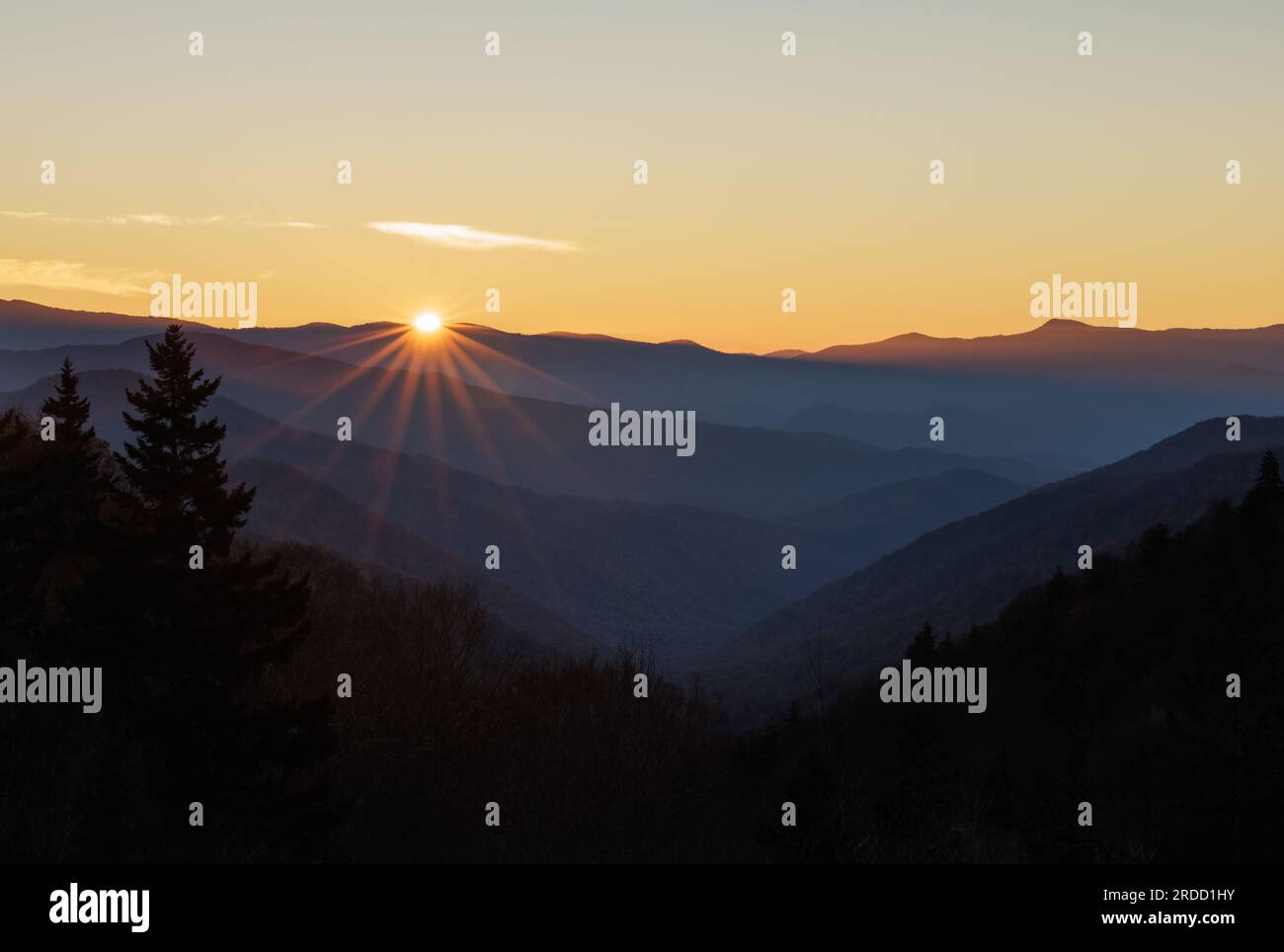 The sun rises over Great Smoky Mountains National Park at Luftee Gap. Stock Photo