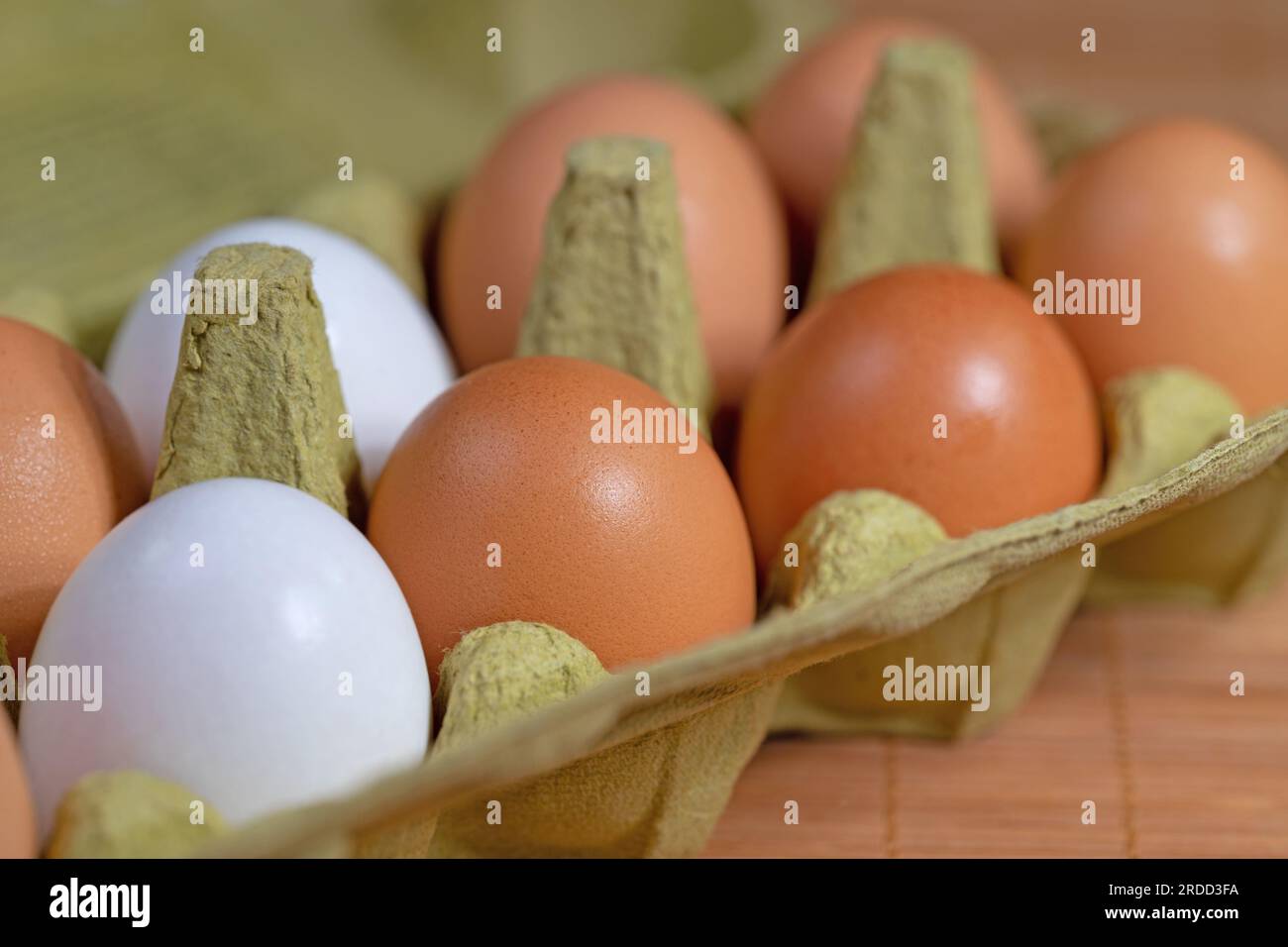 Brown and white chicken eggs in the packaging Stock Photo