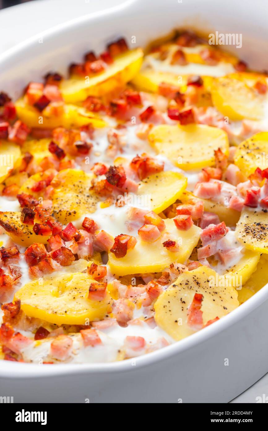 baked potatoes with bacon and eggs Stock Photo
