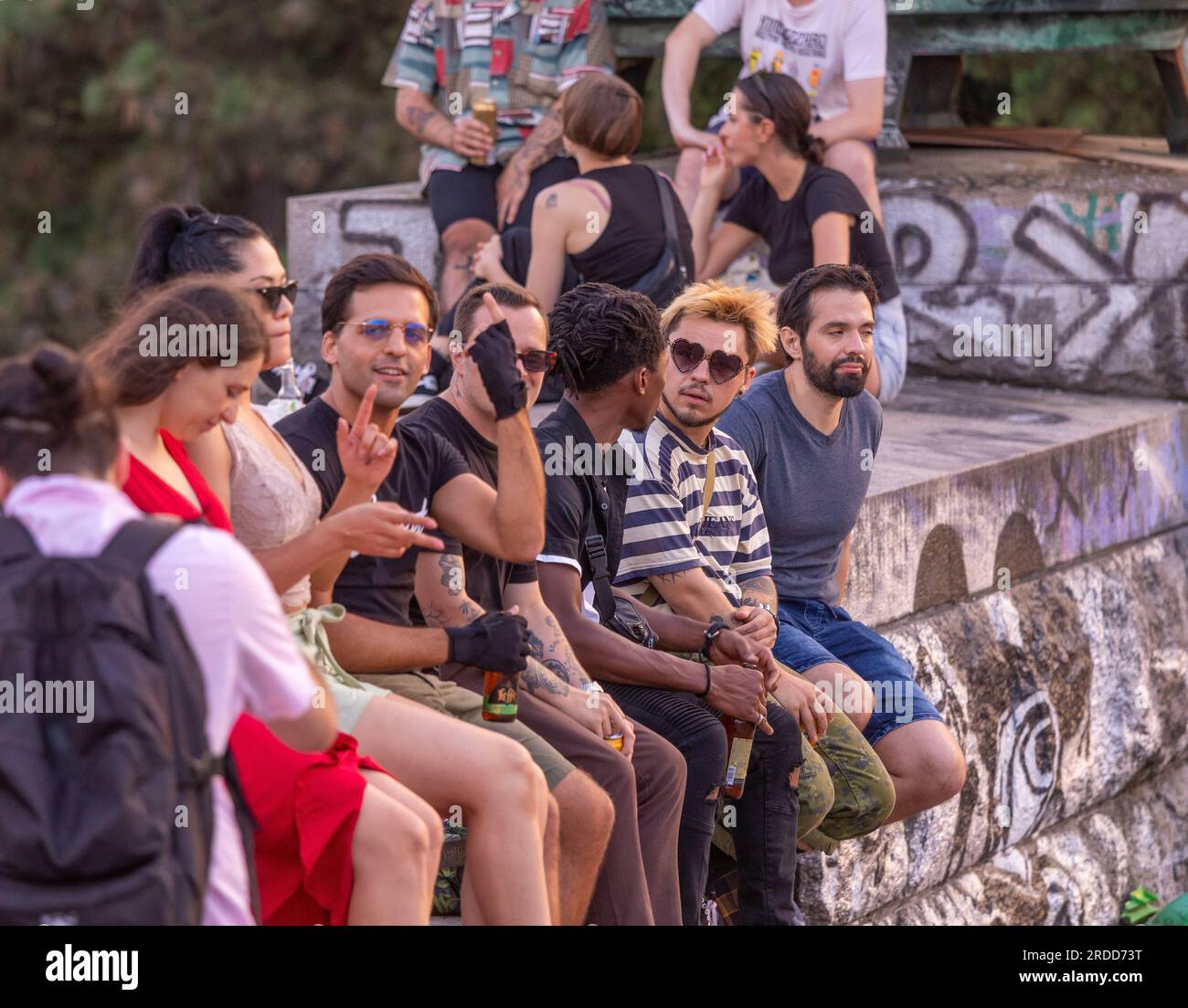 LETNA PARK, PRAGUE, CZECH REPUBLIC, EUROPE - Youth hanging out at Metronome in Letna Park. Stock Photo
