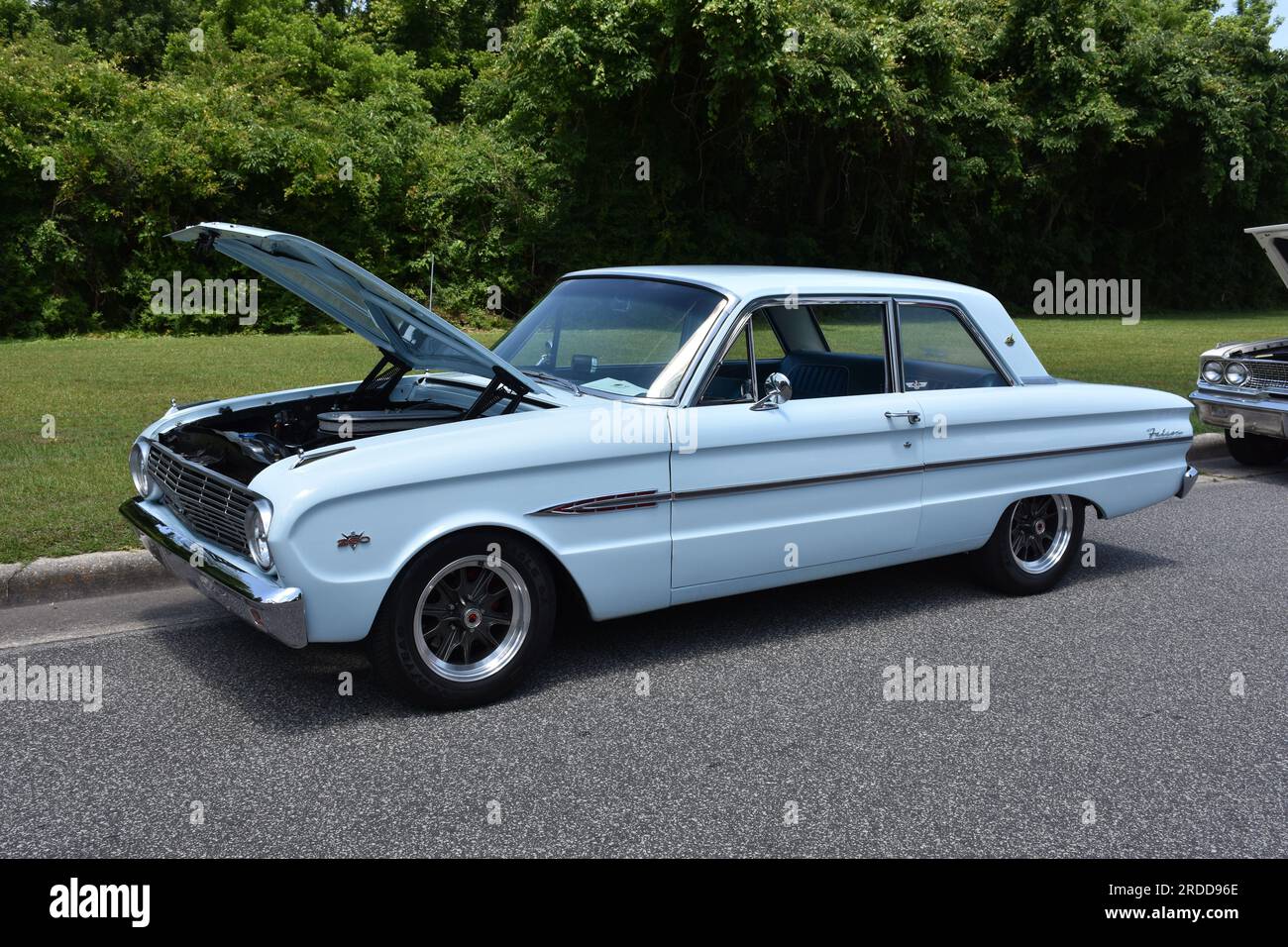 A 1960s Ford Falcon on display at a car show. Stock Photo