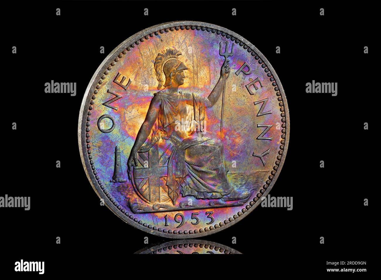 1953 One Penny with rainbow toning. The obverse features the first coin portrait of Queen Elizabeth II by Mary Gillick Stock Photo