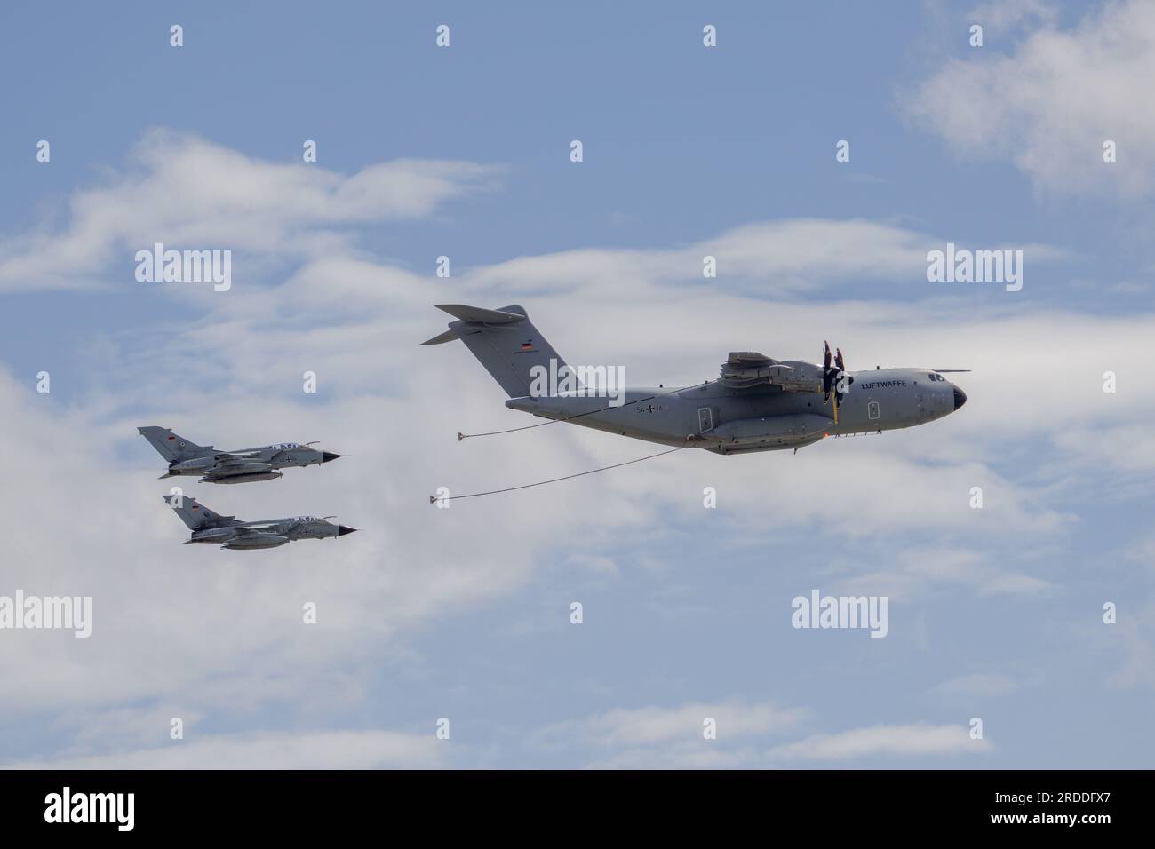 Airbus A400M & Tornados of the Luftwaffe perform a aerial refuelling demonstration at the Royal International Air Tattoo Fairford 2023 Stock Photo