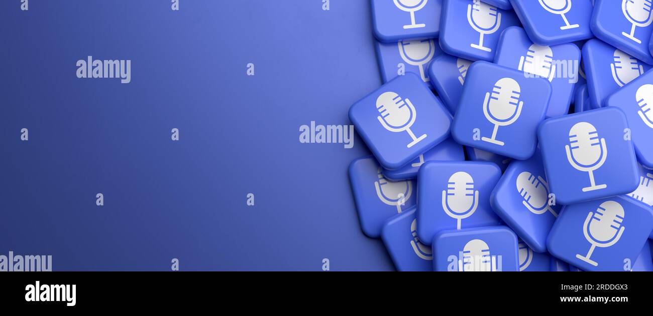 A microphone logo on a heap on a table. Concept for 'podcasts' / 'recording'. Copy space. Web banner format. Stock Photo