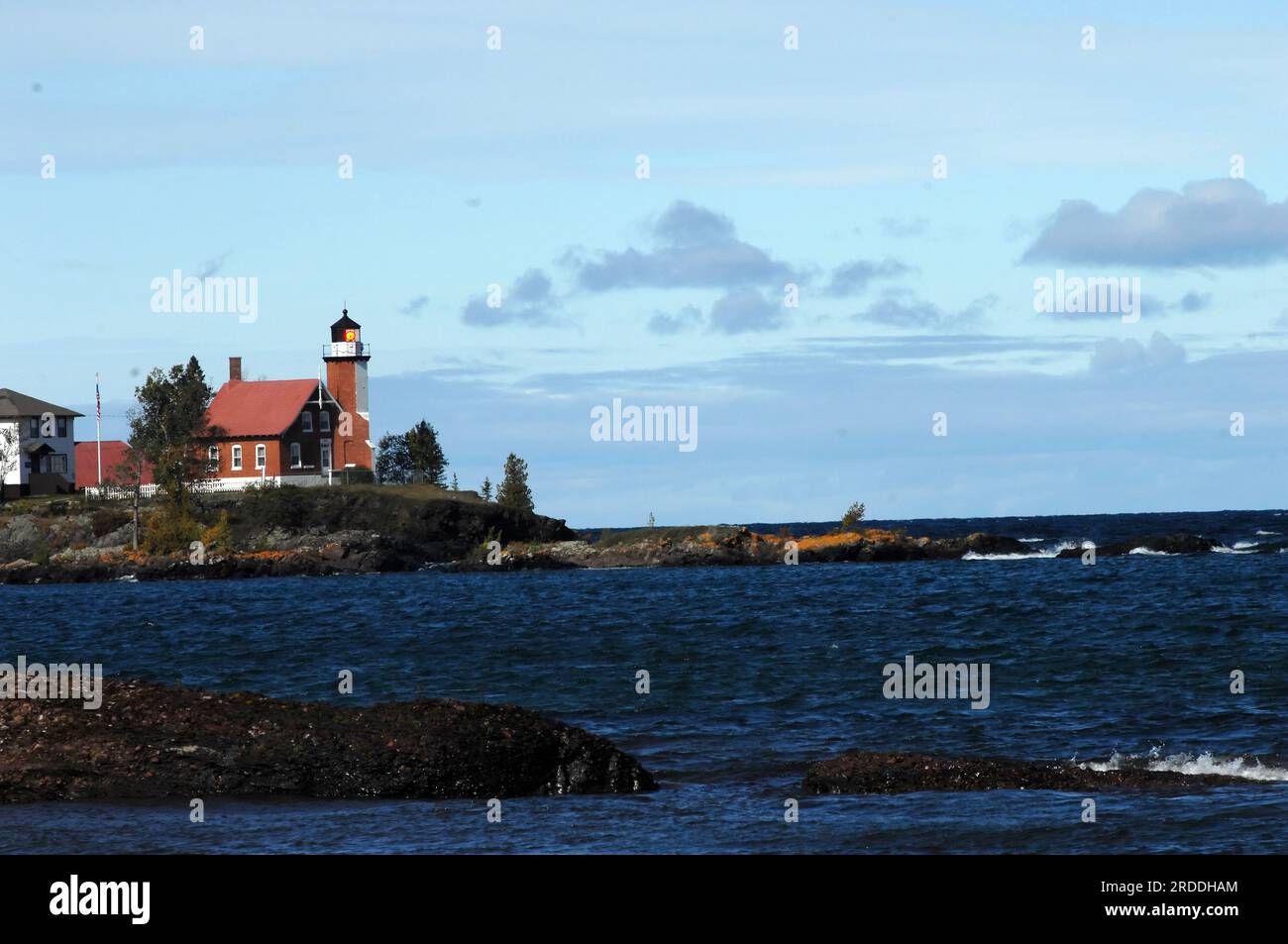 Eagle Harbor Lighthouse sends out its beam of searching light across