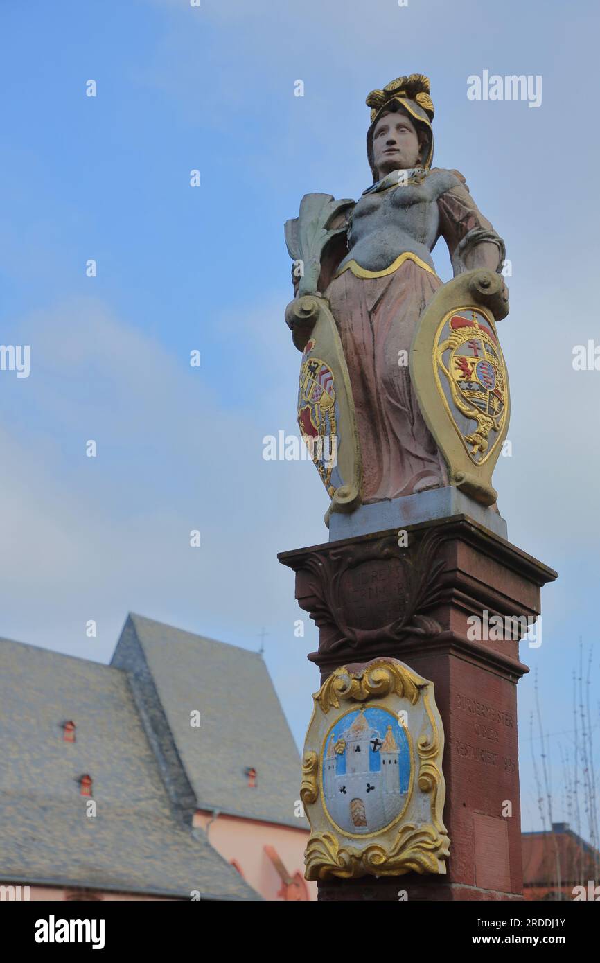 Bidder with shield and coat of arms at the market fountain, market square, Groß-Umstadt, Hesse, Germany Stock Photo