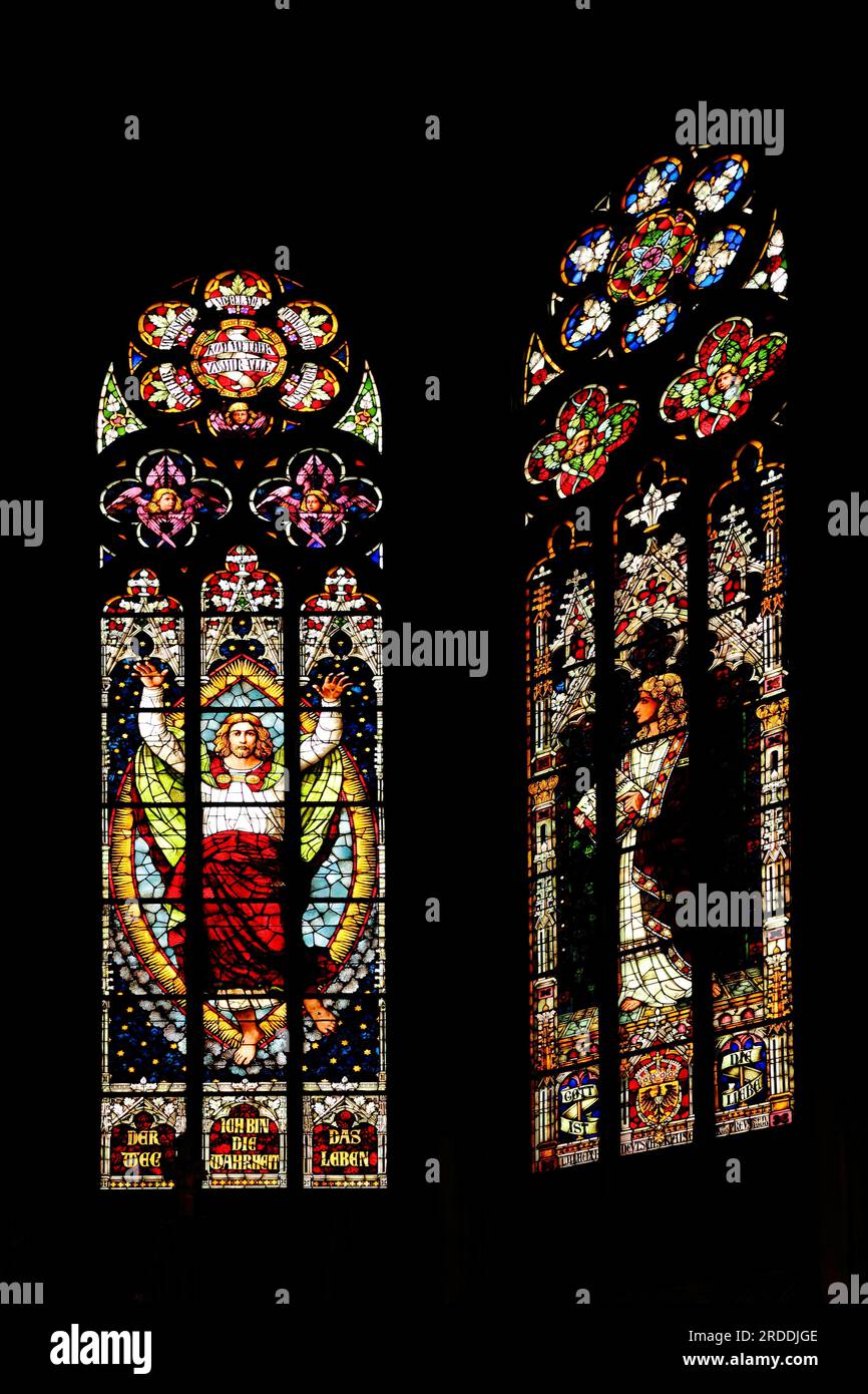 Church window with stained glass with Jesus figure and inscription I am