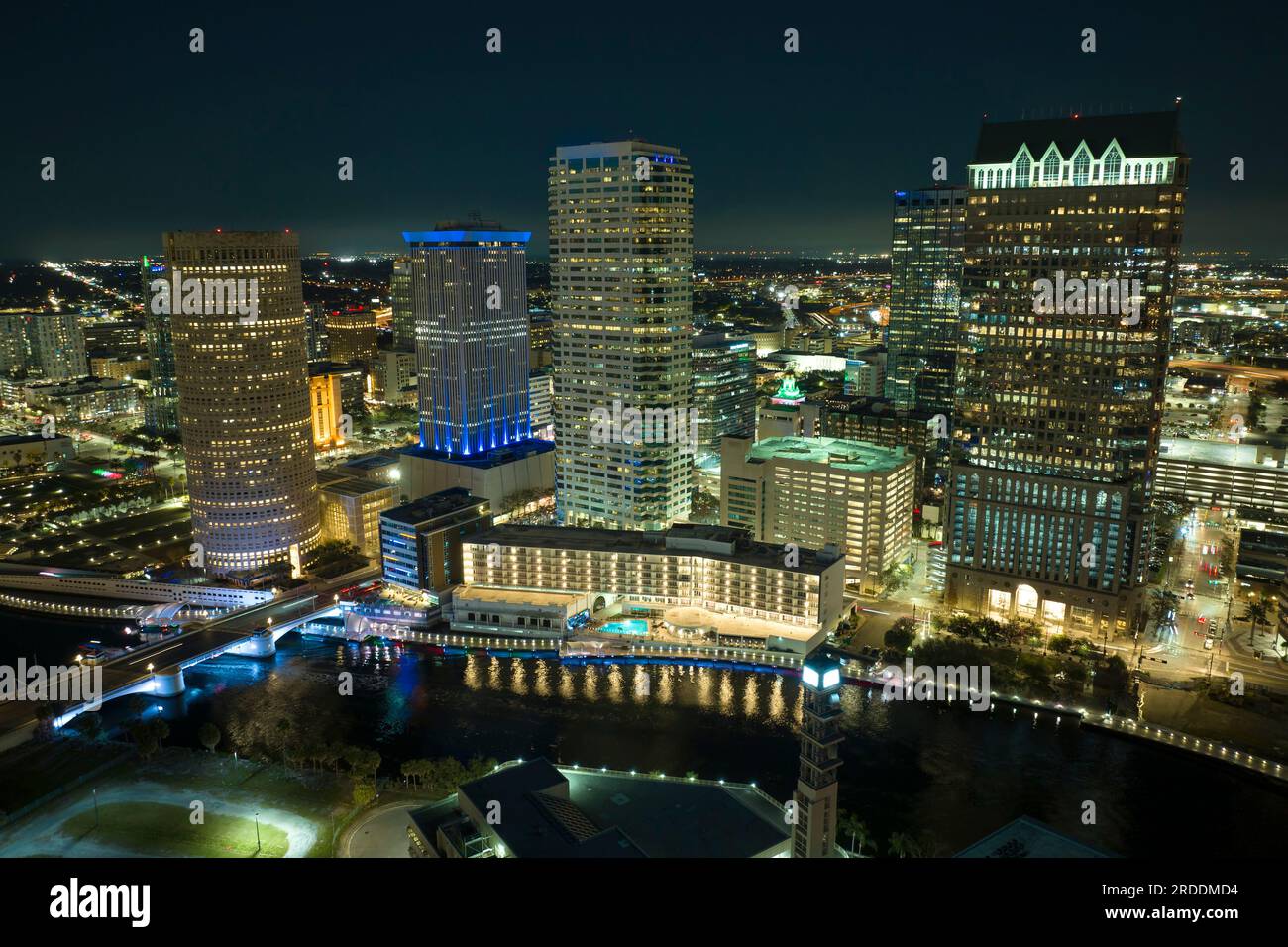 Aerial view of downtown district of Tampa city in Florida, USA. Brightly illuminated high skyscraper buildings and moving traffic in modern american Stock Photo