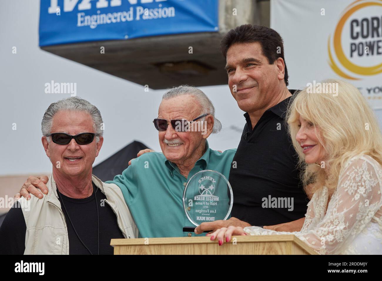Venice, California, USA. 2nd Sep, 2013. Lou Ferrigno at his induction into the Muscle Beach Hall Of Fame alongside his wife Carla, and Iron Man Magazine Publisher John Balik. (Credit Image: © Ian L. Sitren/ZUMA Press Wire) EDITORIAL USAGE ONLY! Not for Commercial USAGE! Stock Photo