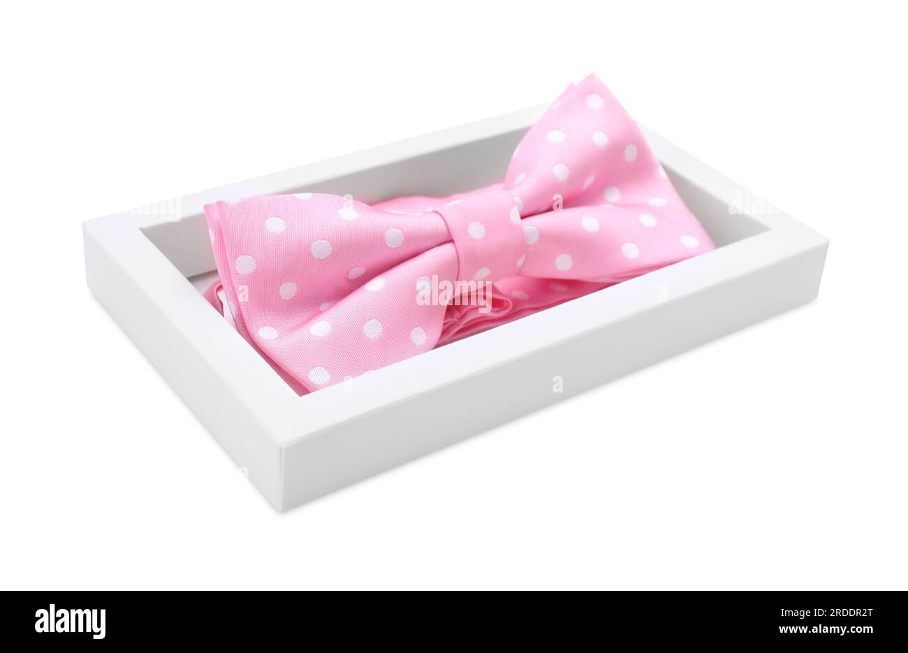 Stylish pink bow tie with polka dot pattern on white background Stock Photo