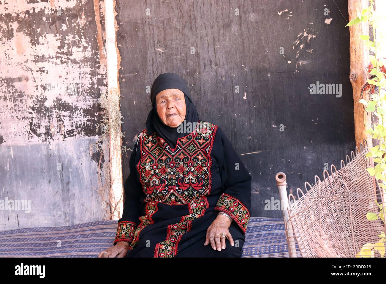 Arab Muslim woman wearing hijab in Wadi Musa, Jordan (the original inhabitants of Petra) old woman wearing Arabic dress Stock Photo