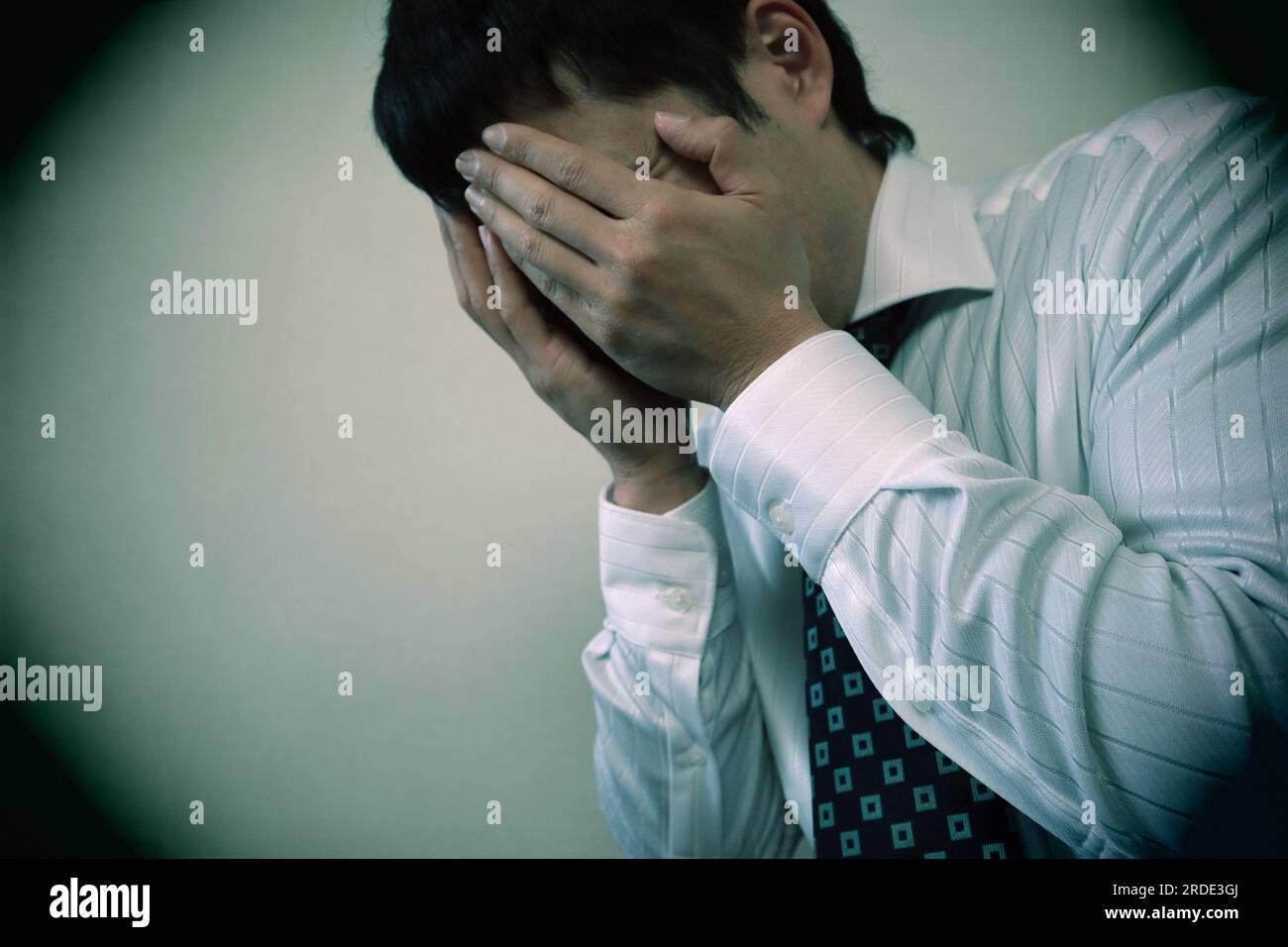 Close-up of depressed office worker Stock Photo