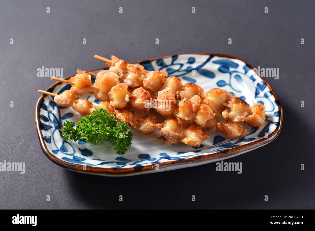 Salt Grilled chicken cartilage Japanese food. Stock Photo