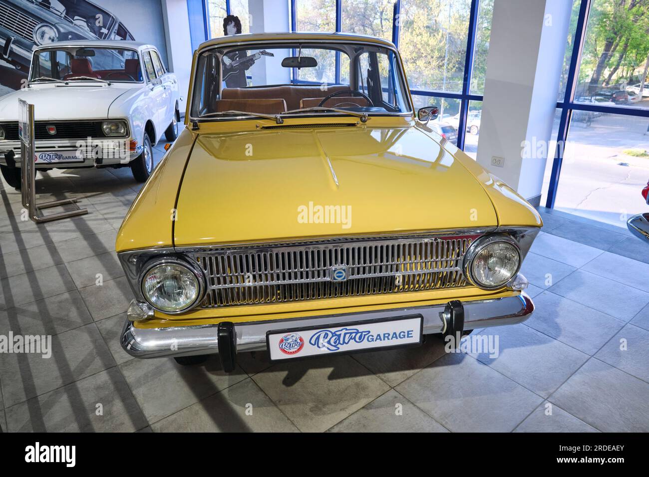A view of a 1960's yellow Moskvich Carat, Elite sedan, model 412 . At the Retro Garage Car Museum of vintage automobiles in Shymkent, Kazakhstan. Stock Photo