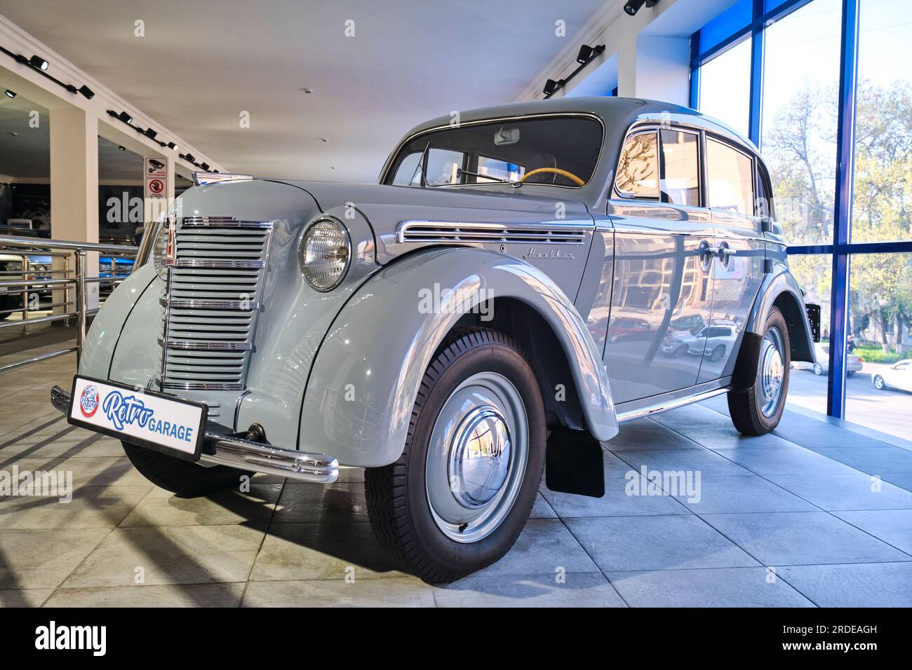 A view of a 1950's light grey Moskvi sedan, model 401. NIcknamed 'The Elephant'. At the Retro Garage Car Museum of vintage automobiles in Shymkent, Ka Stock Photo