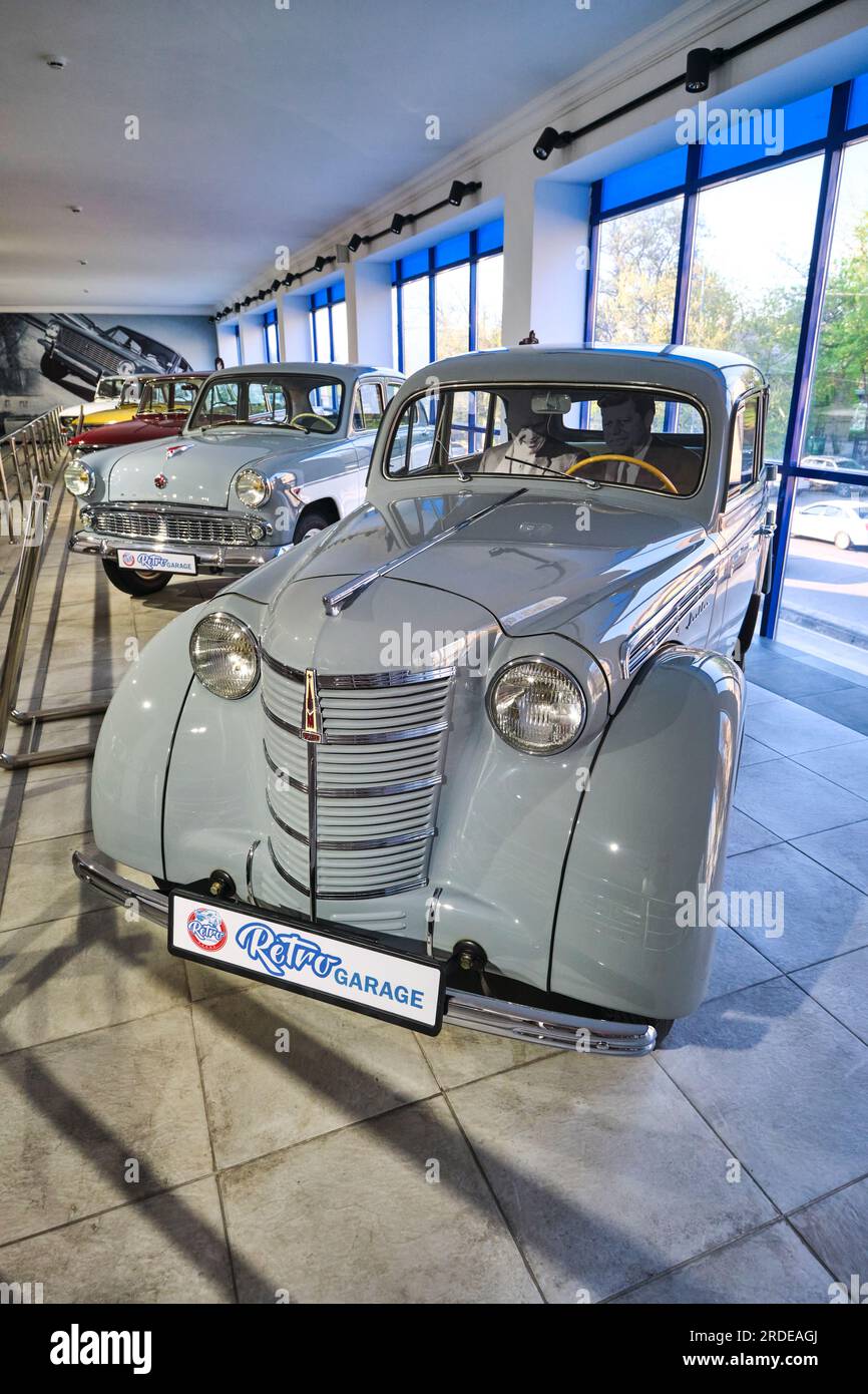 A view of a 1950's light grey Moskvi sedan, model 401. NIcknamed 'The Elephant'. At the Retro Garage Car Museum of vintage automobiles in Shymkent, Ka Stock Photo