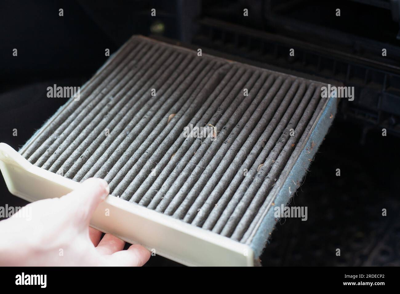 Replacing the ar cabin filter the car. Replacing Dirty Air filter. Stock Photo