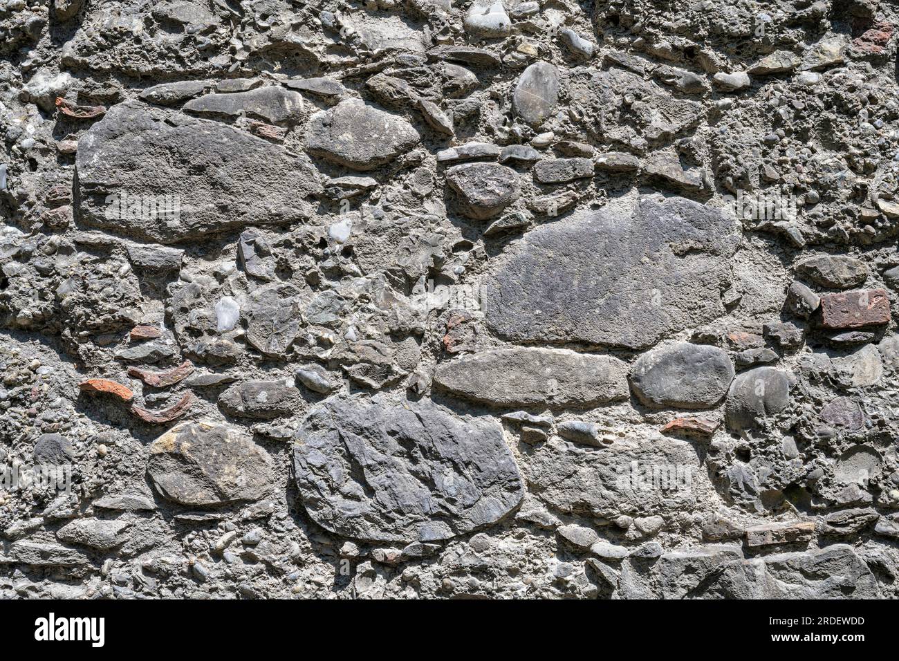 Different types of stone processed into a wall Formatfilling Stock