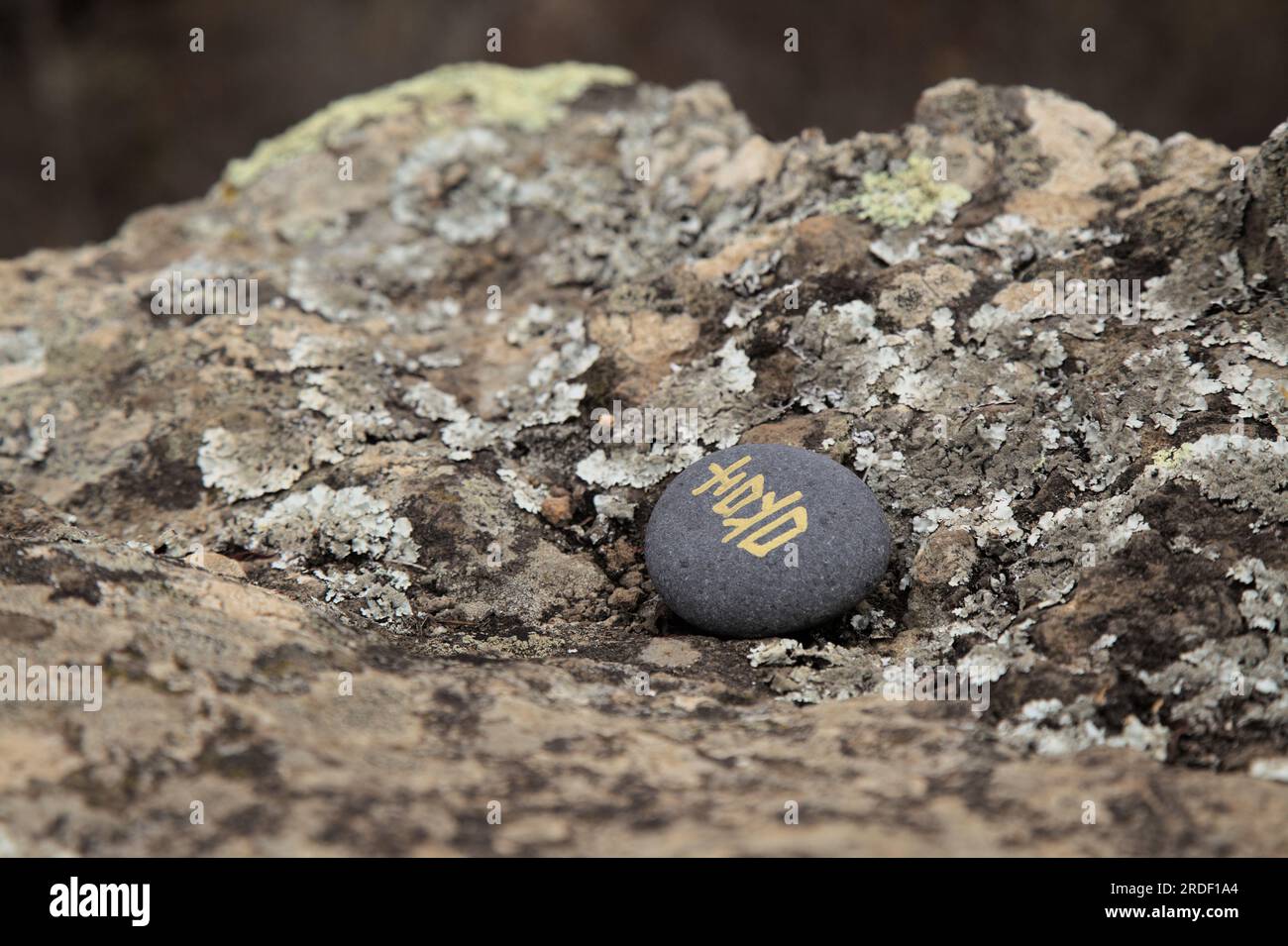 Chinese character xi or Japanese ki, meaning joy, written on a volcanic