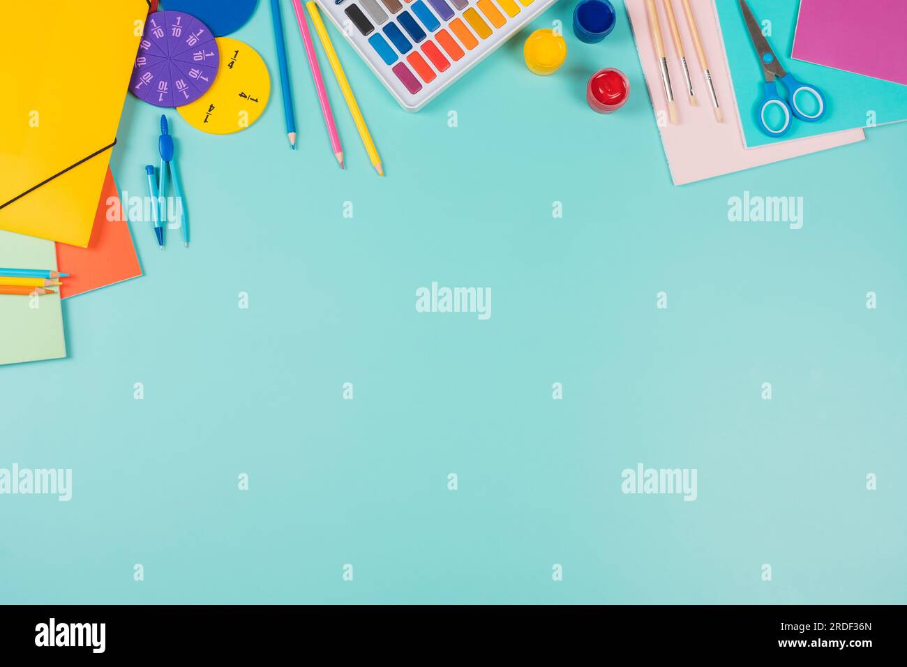 Back to school, education background. Colored pencils, books, notebooks ...