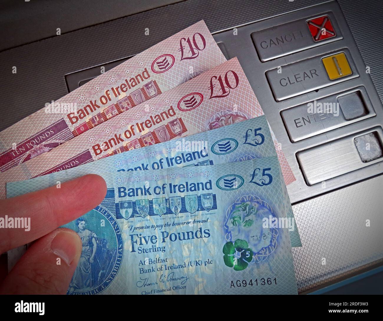 Bank of Ireland northern Irish Sterling cash notes dispensed from an ATM cash machine,1,Donegall Square South, Belfast, BT1 5LR, Co. Antrim, NI BT15LR Stock Photo