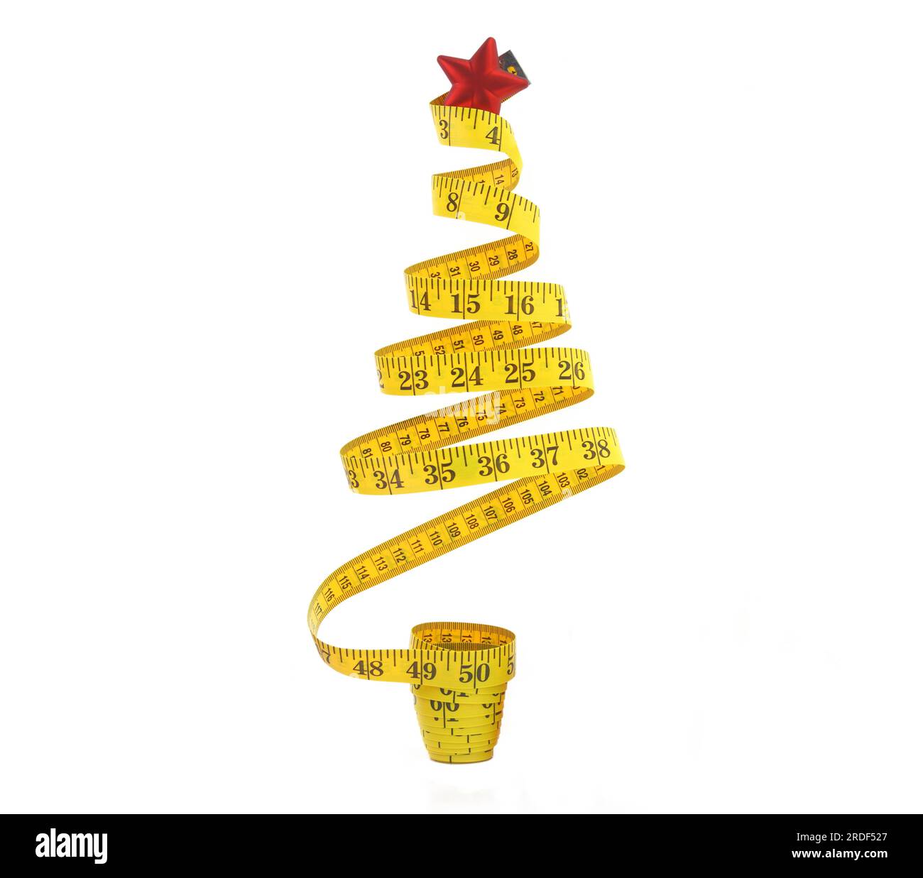Christmas tree shape measure tape isolated white background Stock Photo