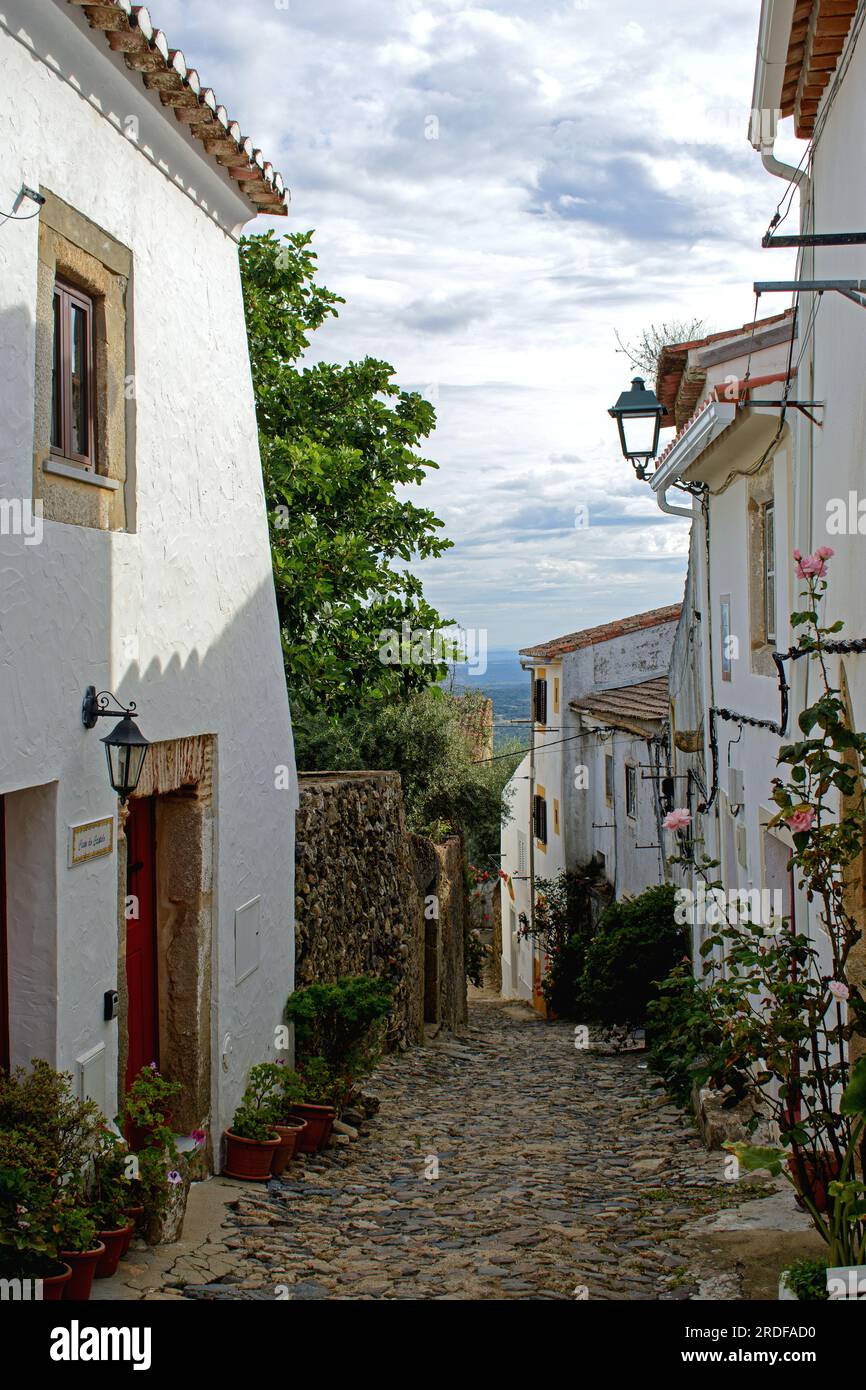 Castelo de Vide, Portalegre district, Portugal. View down Rua Direita, a narrow cobbled street in the old quarter. Stock Photo