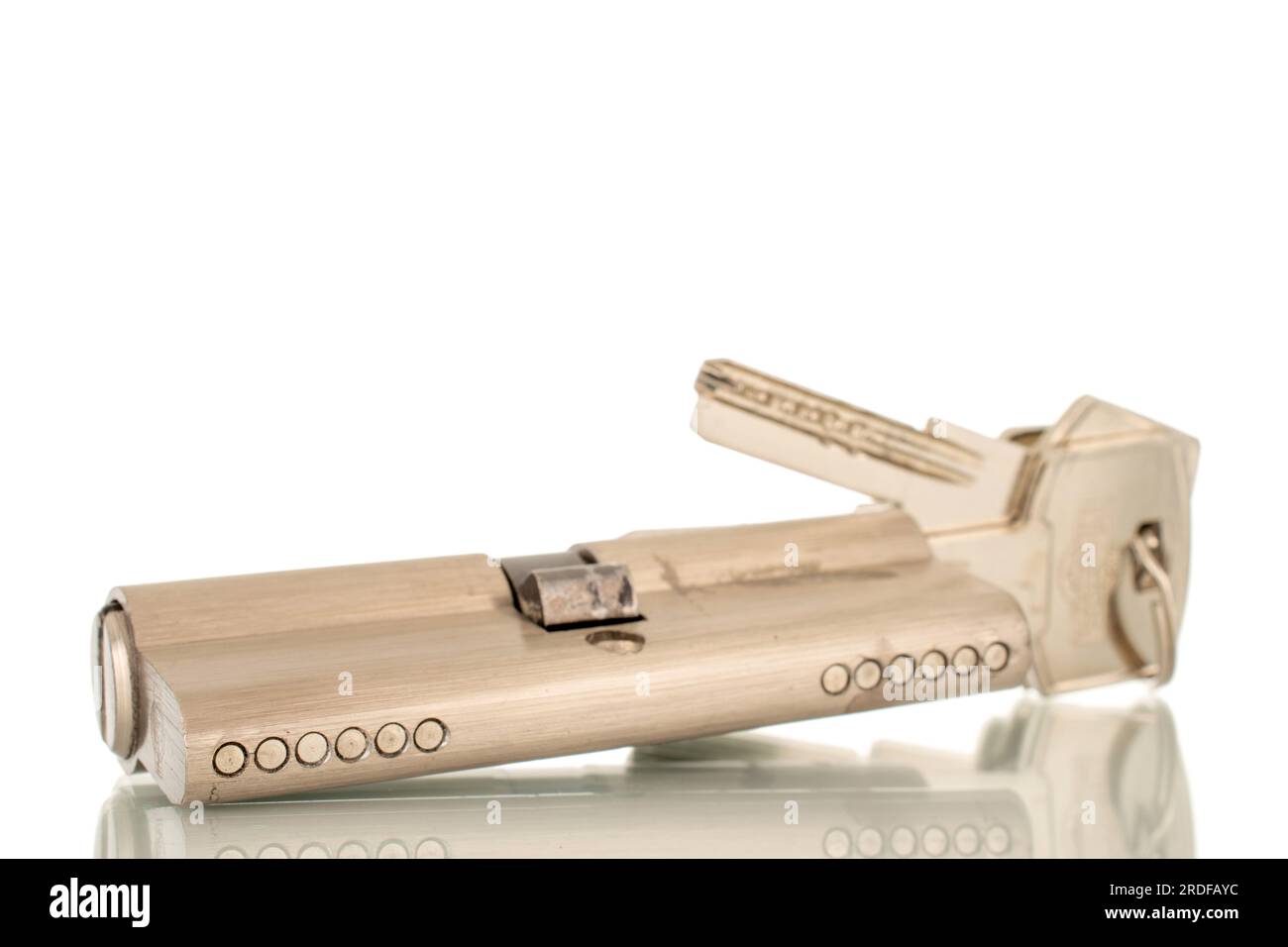 One core metal lock with key, macro, isolated on white background Stock ...