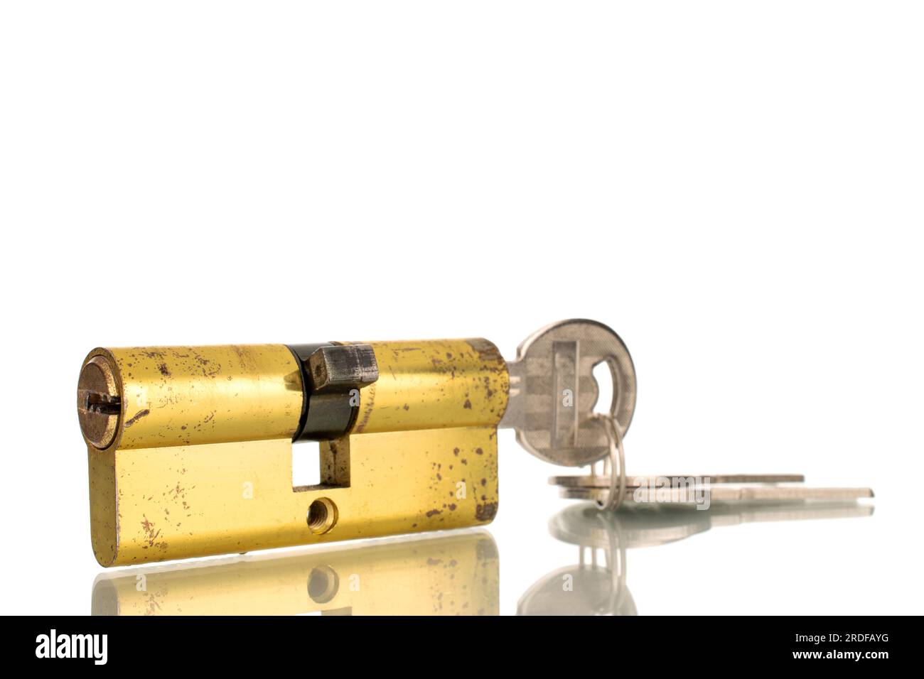One core metal lock with key, macro, isolated on white background Stock ...