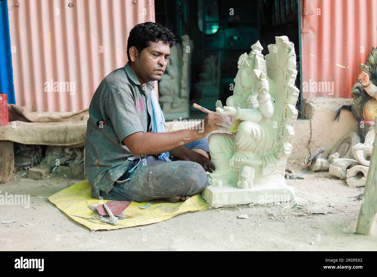 Ganesh, Ganpati idol or murti making process, Workshop for making idols of lord Ganesh for upcoming Ganapati festival in India. Stock Photo