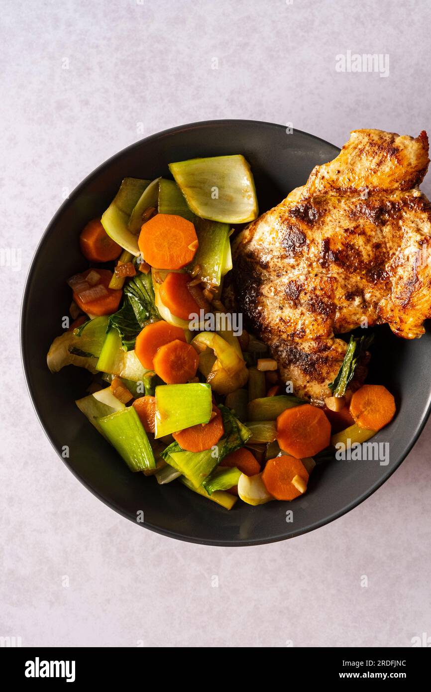Chicken steak with chinese cabbage and carrot oyster sauce stir fry Stock Photo Alamy