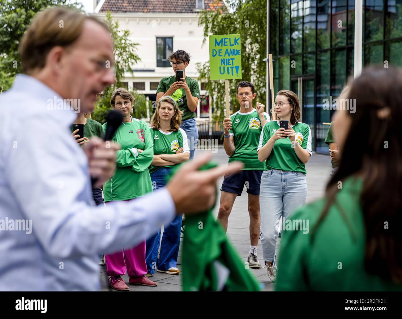 AMERSFOORT - CEO Jan Derck van Karnebeek of FrieslandCampina is talking to demonstrators from Milieudefensie Jong in front of the dairy company's head office. The youth organization wants an answer to the question of whether FrieslandCampina intends to reduce its CO2 emissions in line with the Paris Climate Agreement. ANP SEM VAN DER WAL netherlands out - belgium out Stock Photo