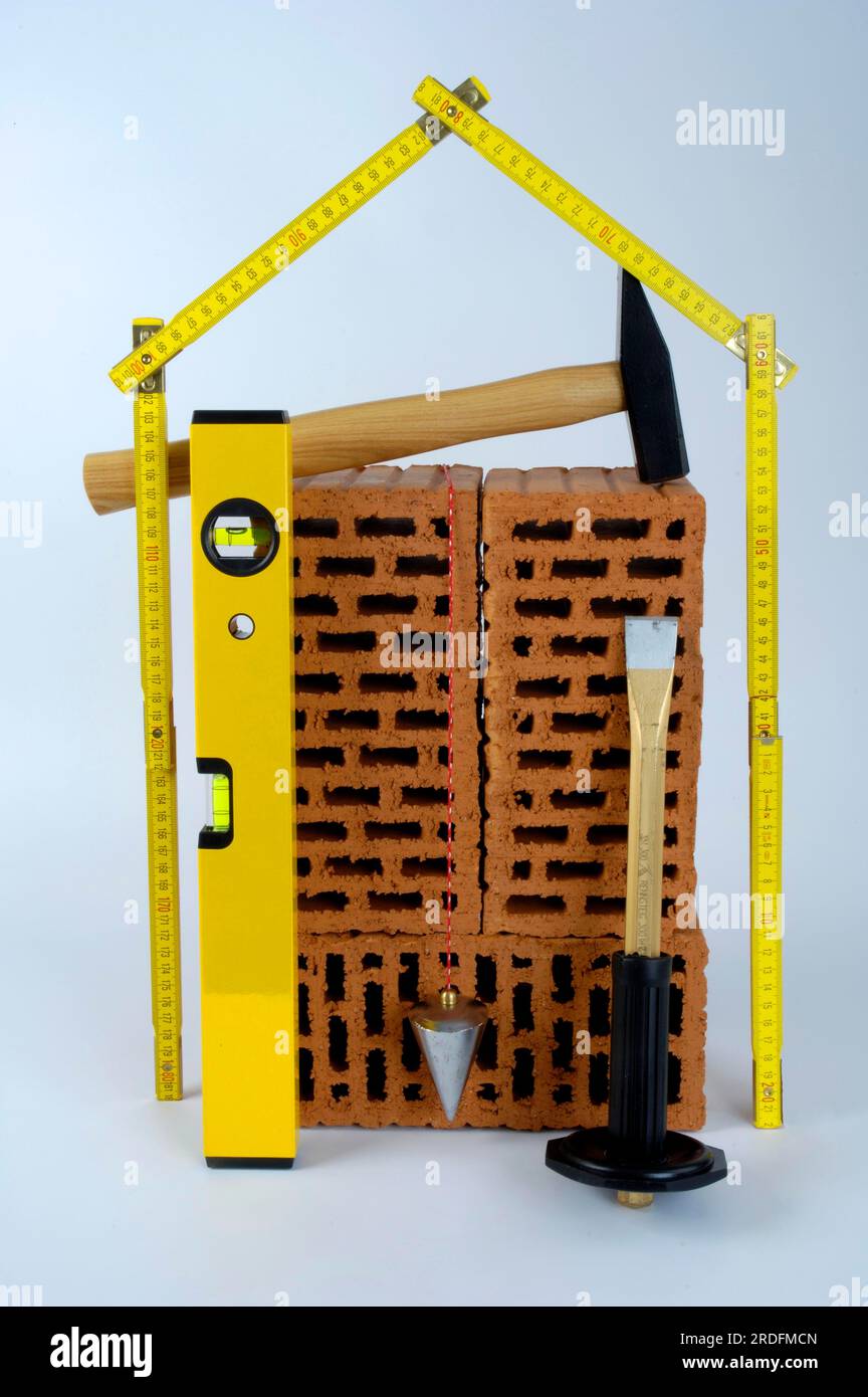 Brick, spirit level, hammer, chisel, plumb bob and scale, folding rule
