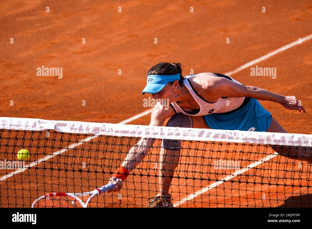 Alize of France in action against Clara Tauson of Denmark during