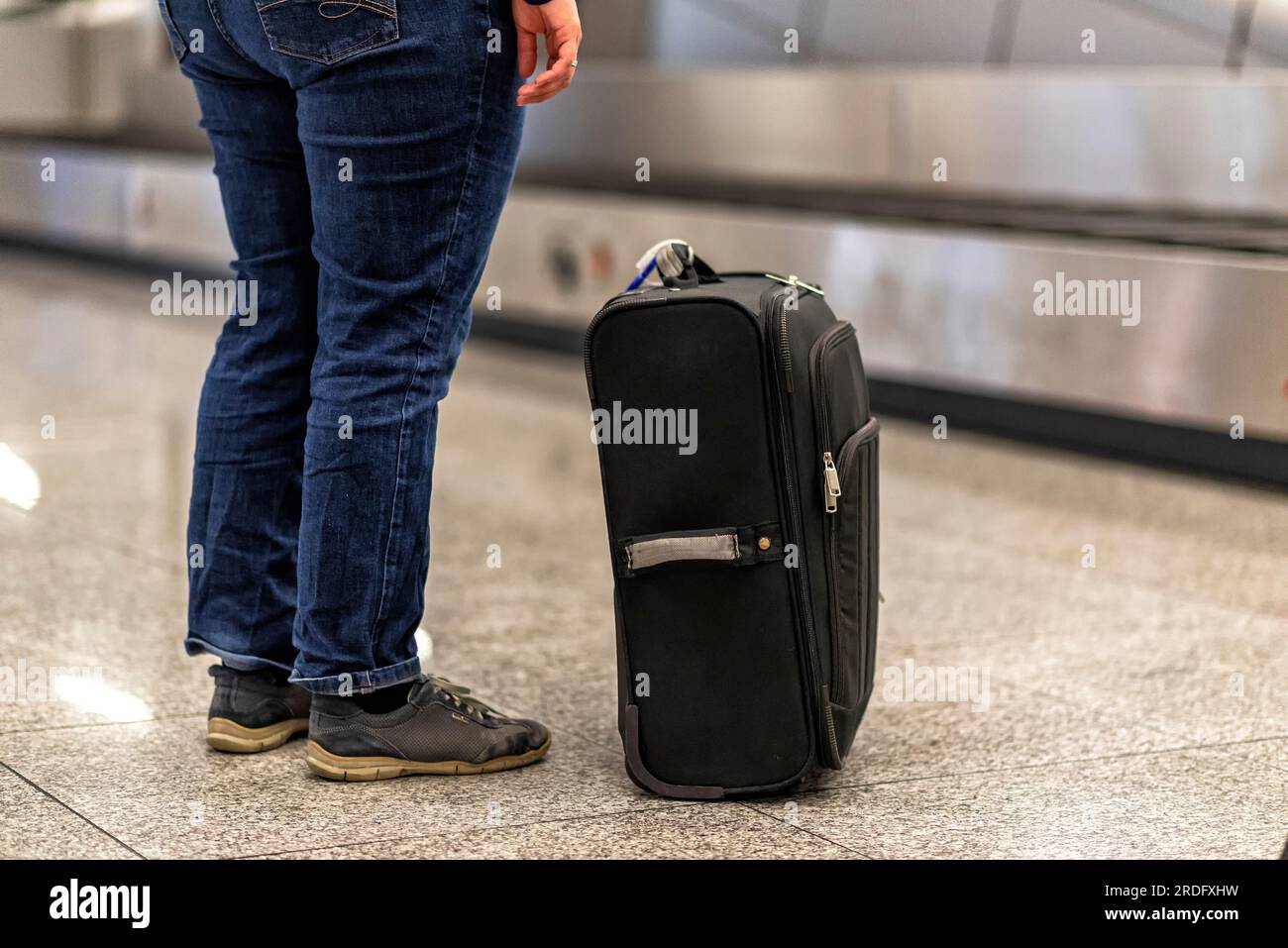 baggage on a baggage carousel an an airport Stock Photo Alamy
