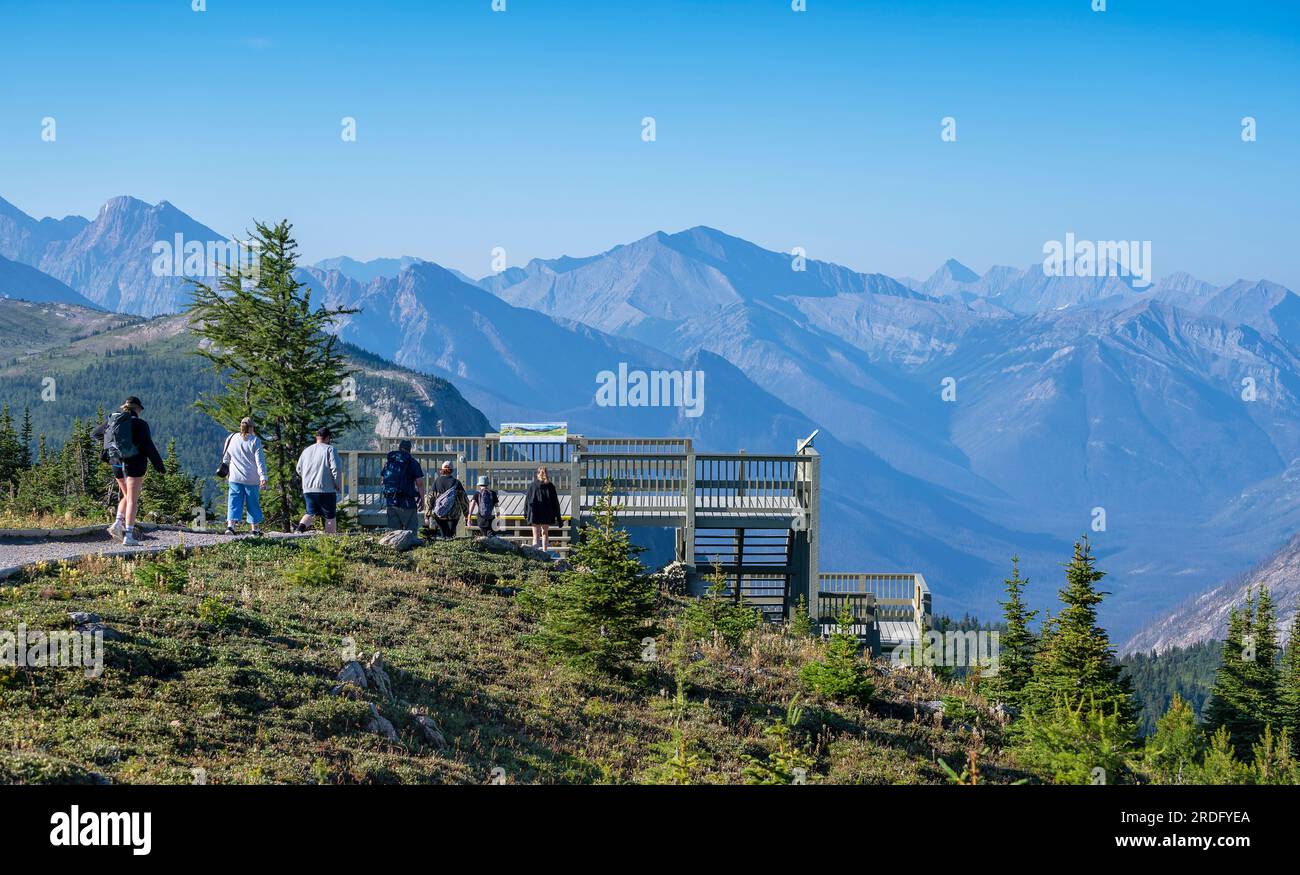 Mount Assiniboine Provincial Park, British Columbia, Canada – July 20, 2023:  People hike to an observation deck in Sunshine Meadows Stock Photo