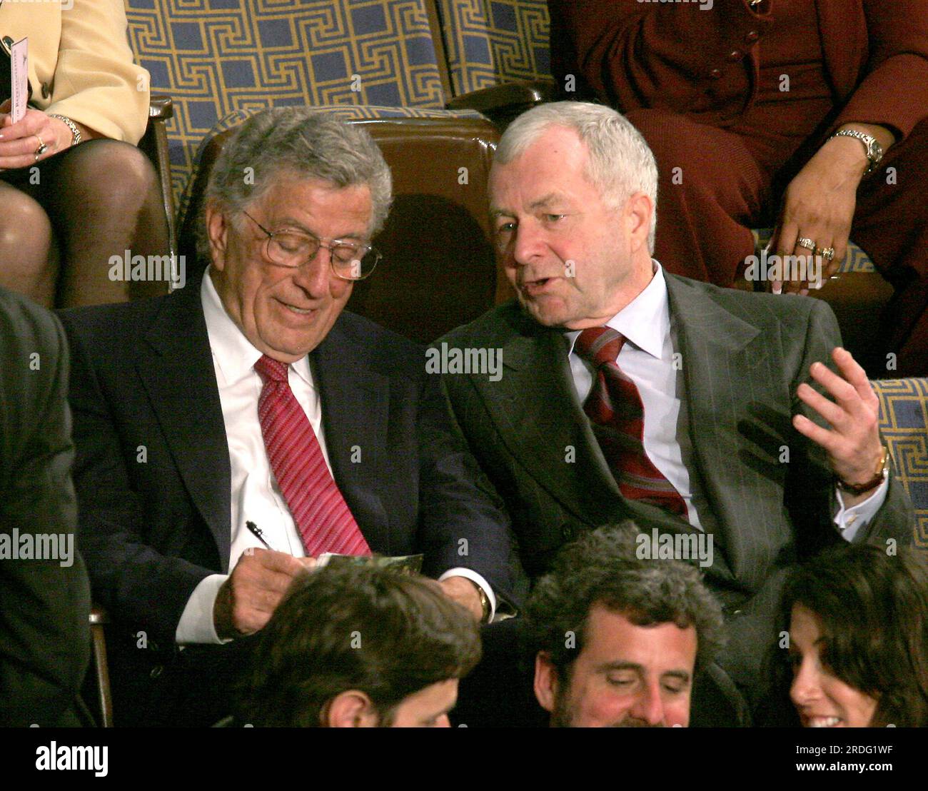 Washington, United States Of America. 04th Jan, 2007. Washington, DC - January 4, 2007 -- Singer Tony Bennett, left, and an unidentified gentlemen, right, watch the voting for United States Representative Nancy Pelosi (Democrat of the 8th District of California) as the Speaker of the United States House of Representatives in the Capitol in Washington, DC on Thursday, January 4, 2007. Speaker Pelosi is the first woman in U.S. history to serve in that position.Credit: Ron Sachs/CNP/Sipa USA Credit: Sipa USA/Alamy Live News Stock Photo