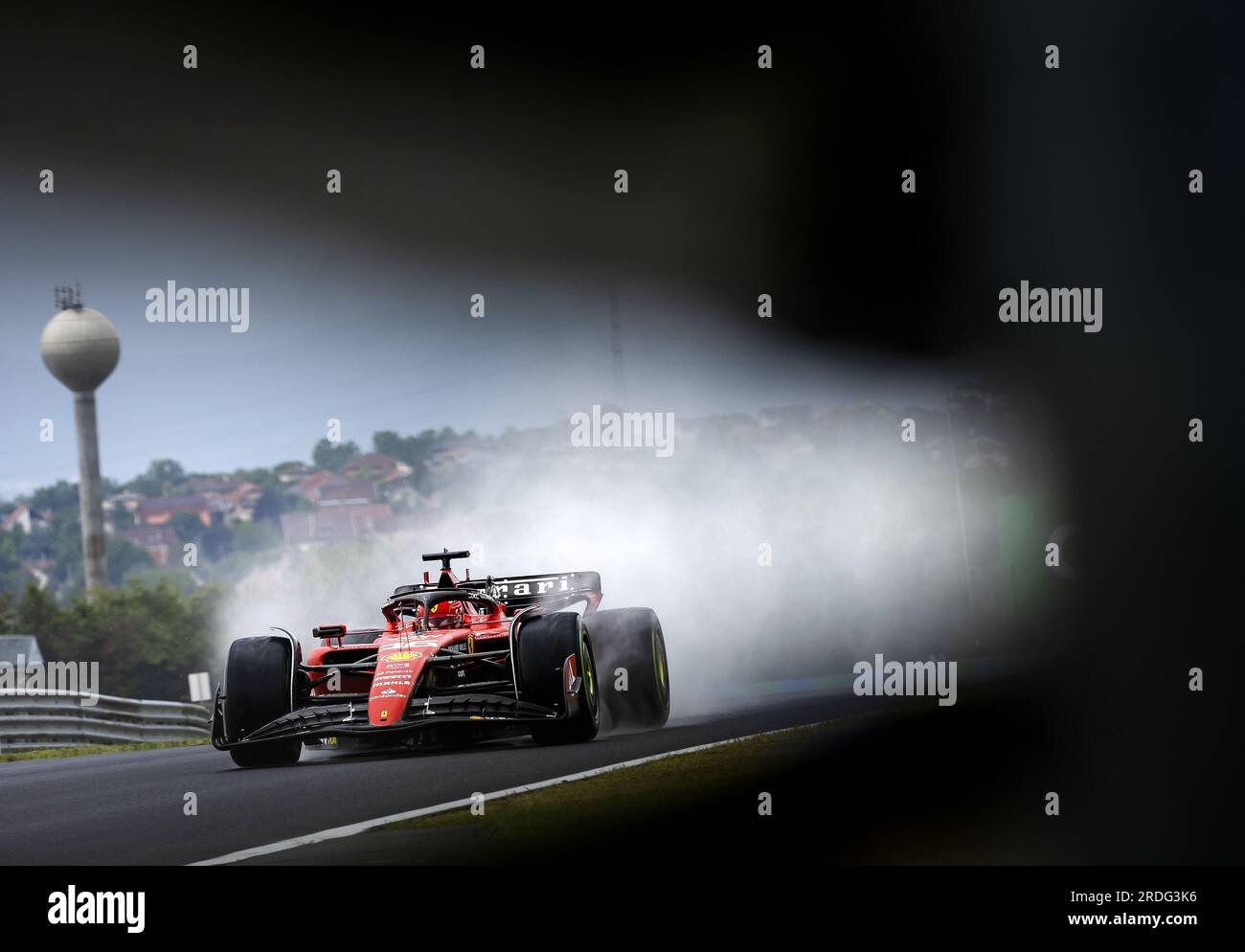 BUDAPEST - 21/07/2023,  Charles Leclerc (Ferrari) in the rain during the 1st free practice on the Hungaroring Circuit in the run-up to the Hungarian Grand Prix. ANP REMKO DE WAAL Stock Photo