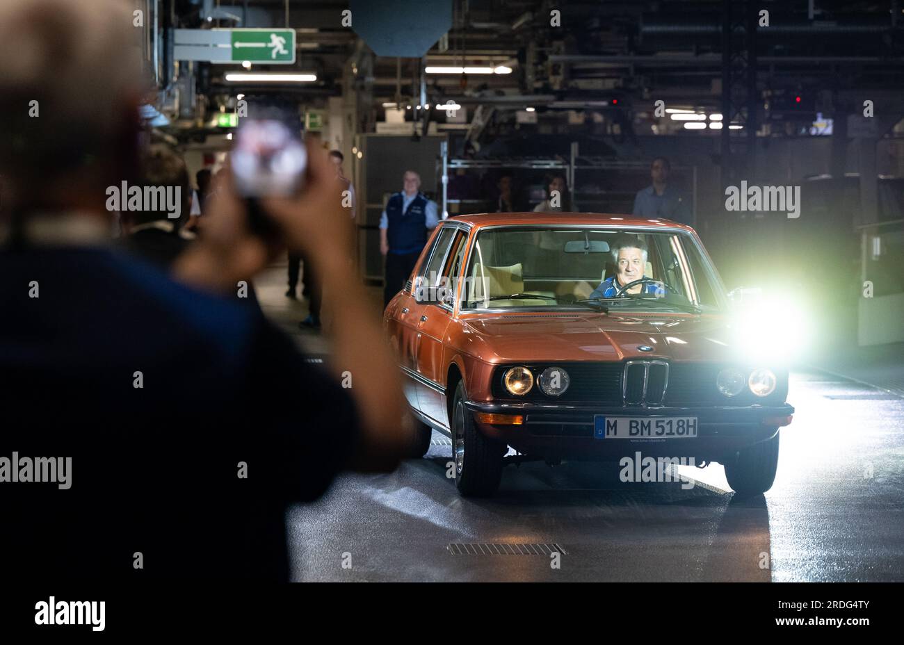 Dingolfing, Germany. 21st July, 2023. A first-generation BMW 5 Series is seen at the production launch of the all-electric BMW i5. Credit: Sven Hoppe/dpa/Alamy Live News Stock Photo